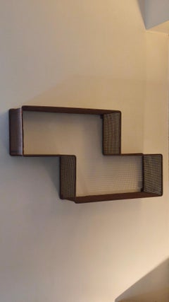 Mathieu Matégot Midcentury Dedal wall shelf, red perforated metal, France, 50s