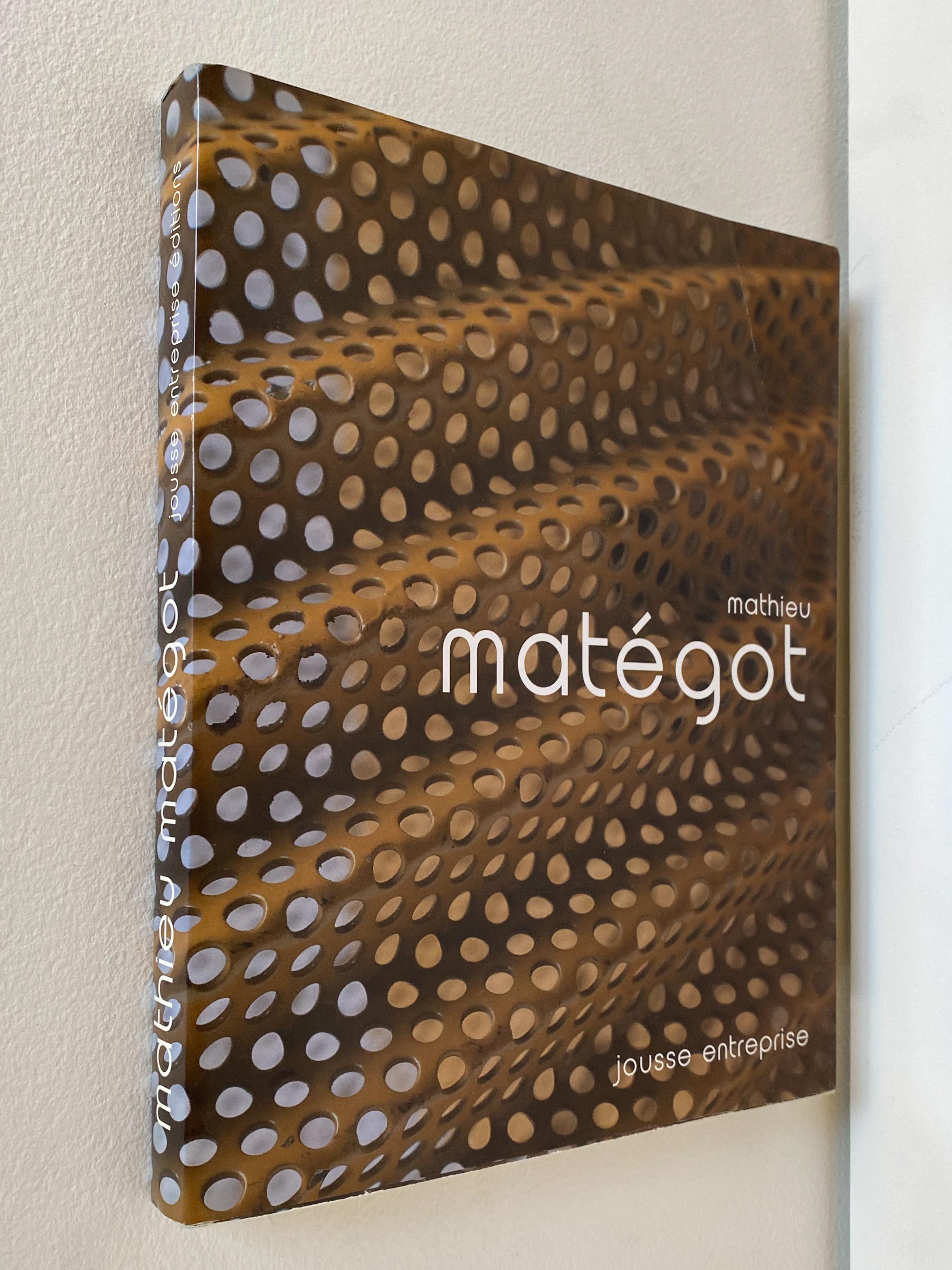 Monograph on the French designer Mathiieu Mategot published by Jousse Enterprise Editions in 2003. First edition in paperback, as issued. 256 pages with English and French text, profusely illustrated in color and black and white. A definitive and