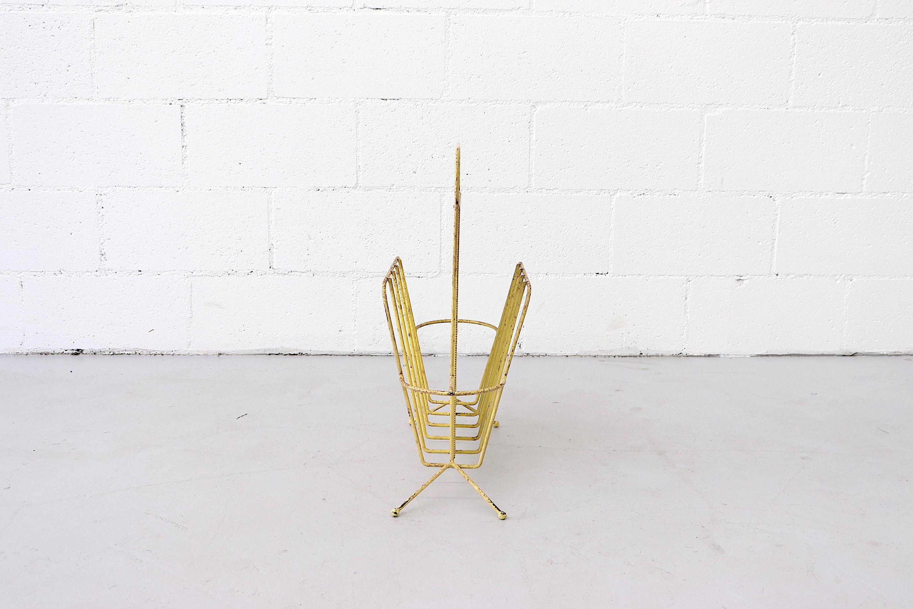 Yellow Painted Mathieu Mategot Perforated Magazine Rack for Artimeta Soest in Very Original Condition with Visible Wear. Another Available and Listed Separately.