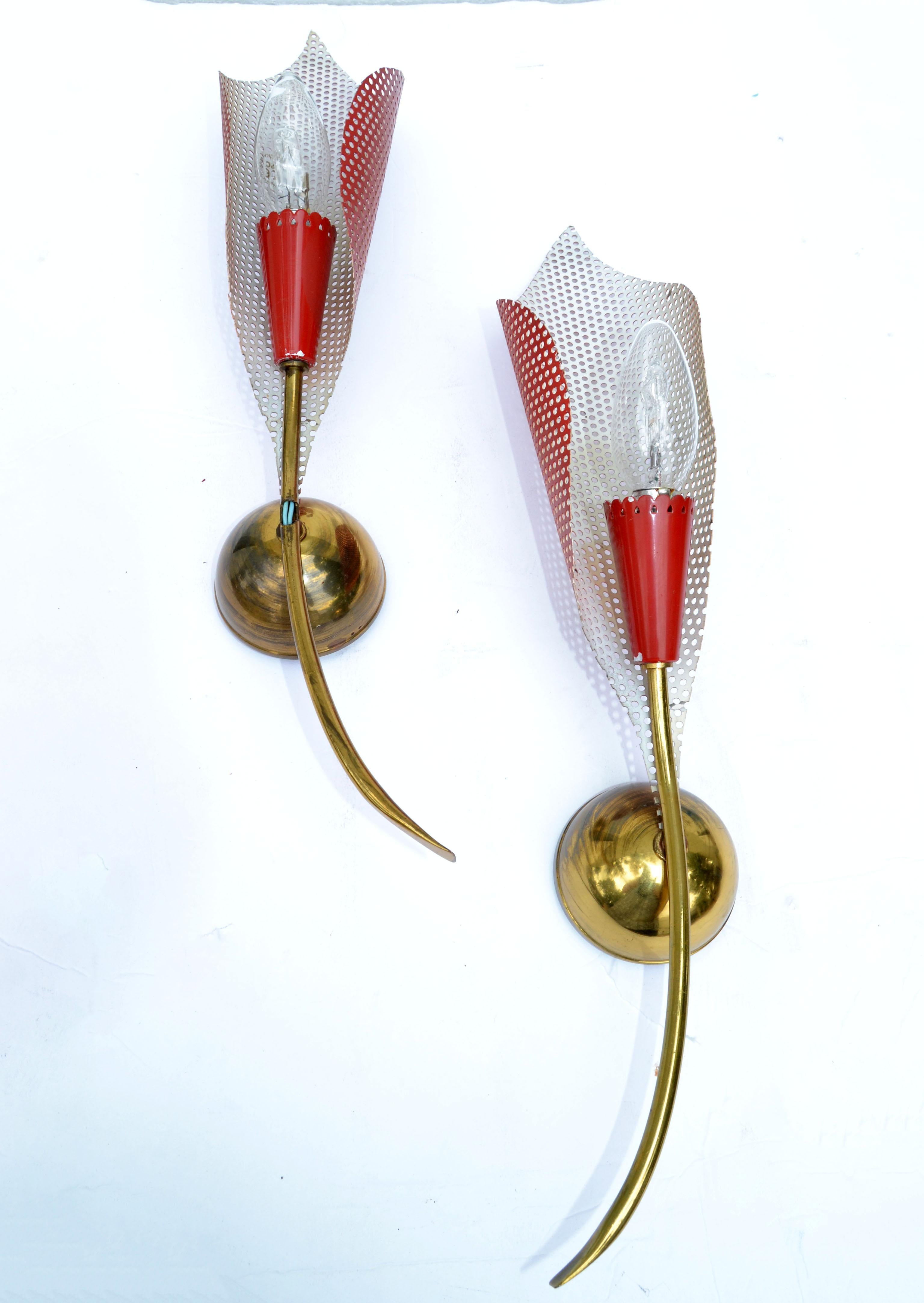 Pair of superb French Mid-Century Modern Mathieu Matégot sconces, wall lamps from the 1960.
Metal mesh shades in red & white finish.
US rewired and each socket takes one light bulb max. 60 watts.
Back Plate: 3 inches Diameter, Projection from