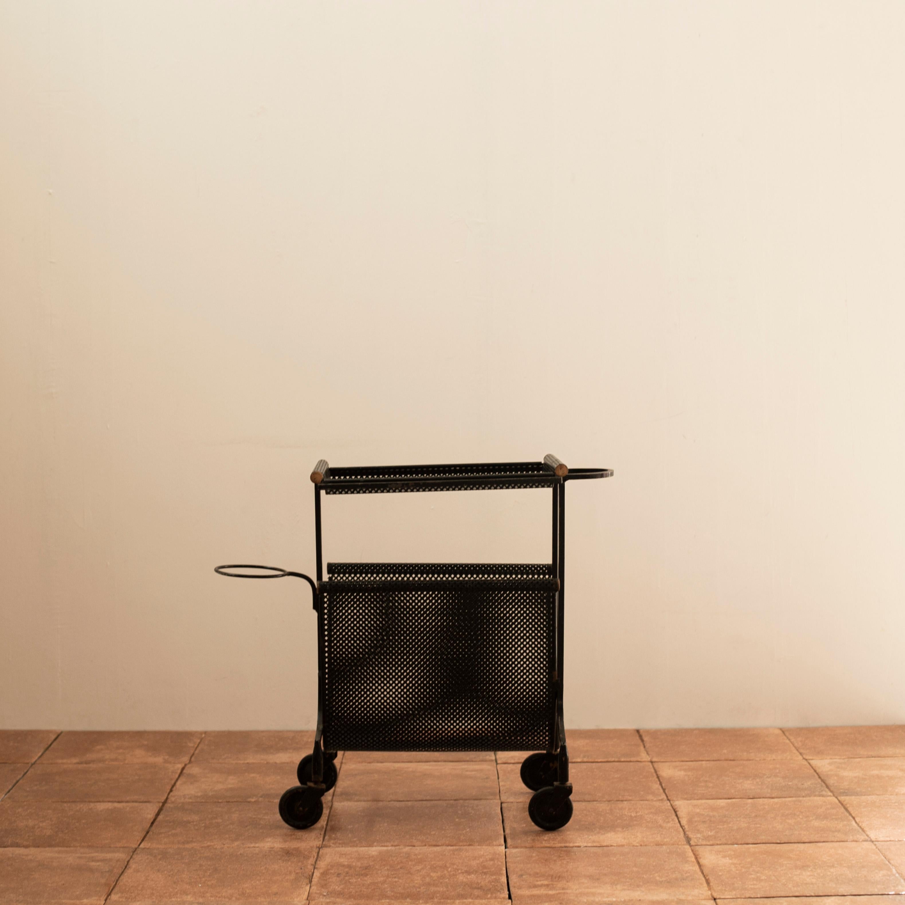 Black lacquered and perforated metal serving trolley designed by Mathieu Matégot in 1950s.