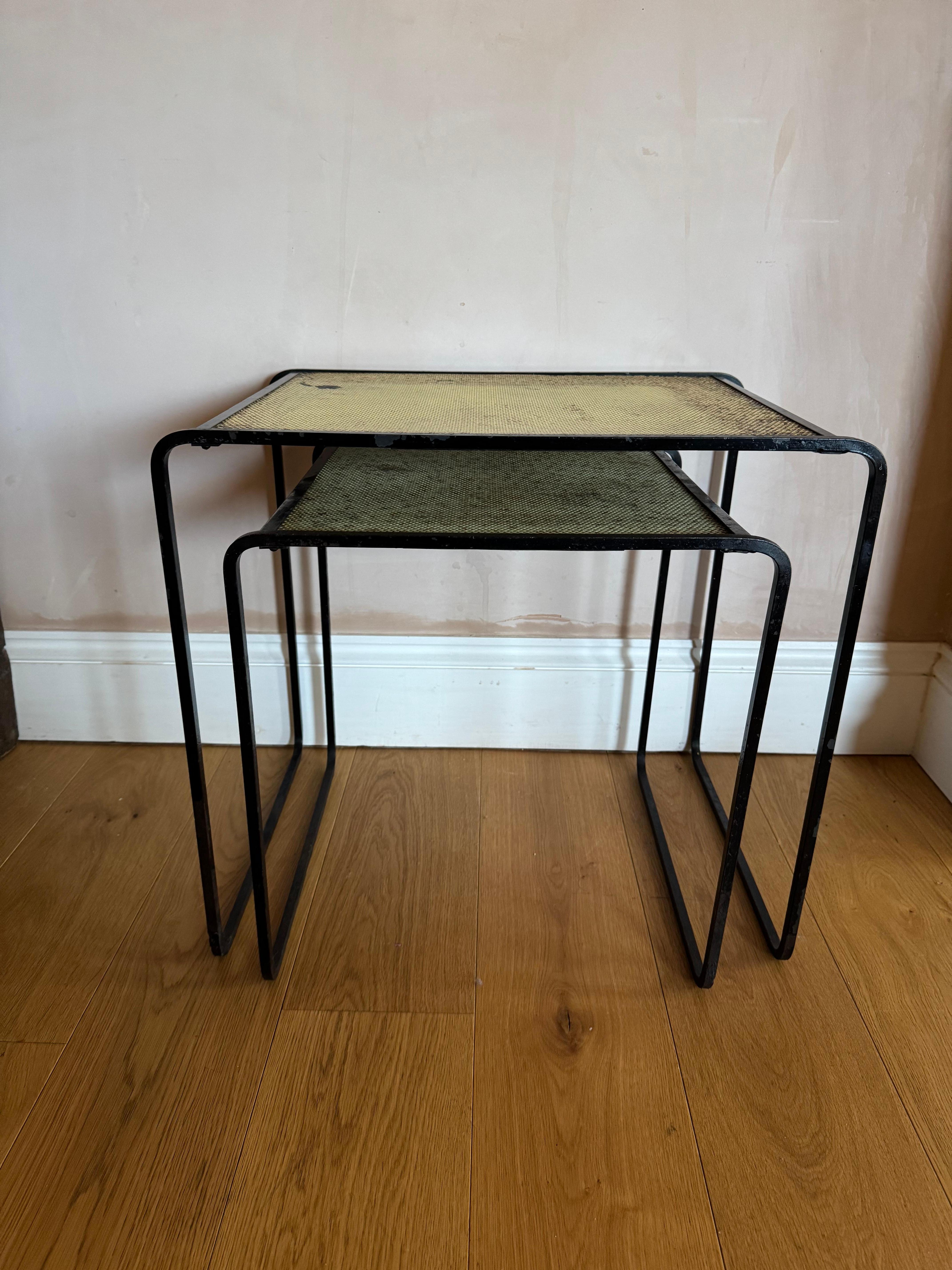 Set of two Mathieu Mategot pierced metal tables with original paint finish. Some paint loss and rust marks but otherwise great original 1950’s tables. 