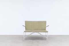 Mathieu Mategot Style White and Green Loveseat with Floral Upholstery