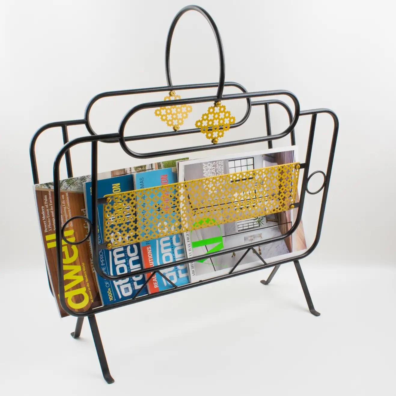 Handsome Mathieu Matégot-style modernist magazine holder or rack. A striking example of a French 1950s metalwork design. Folded, perforated black and yellow metal. Still with the original 