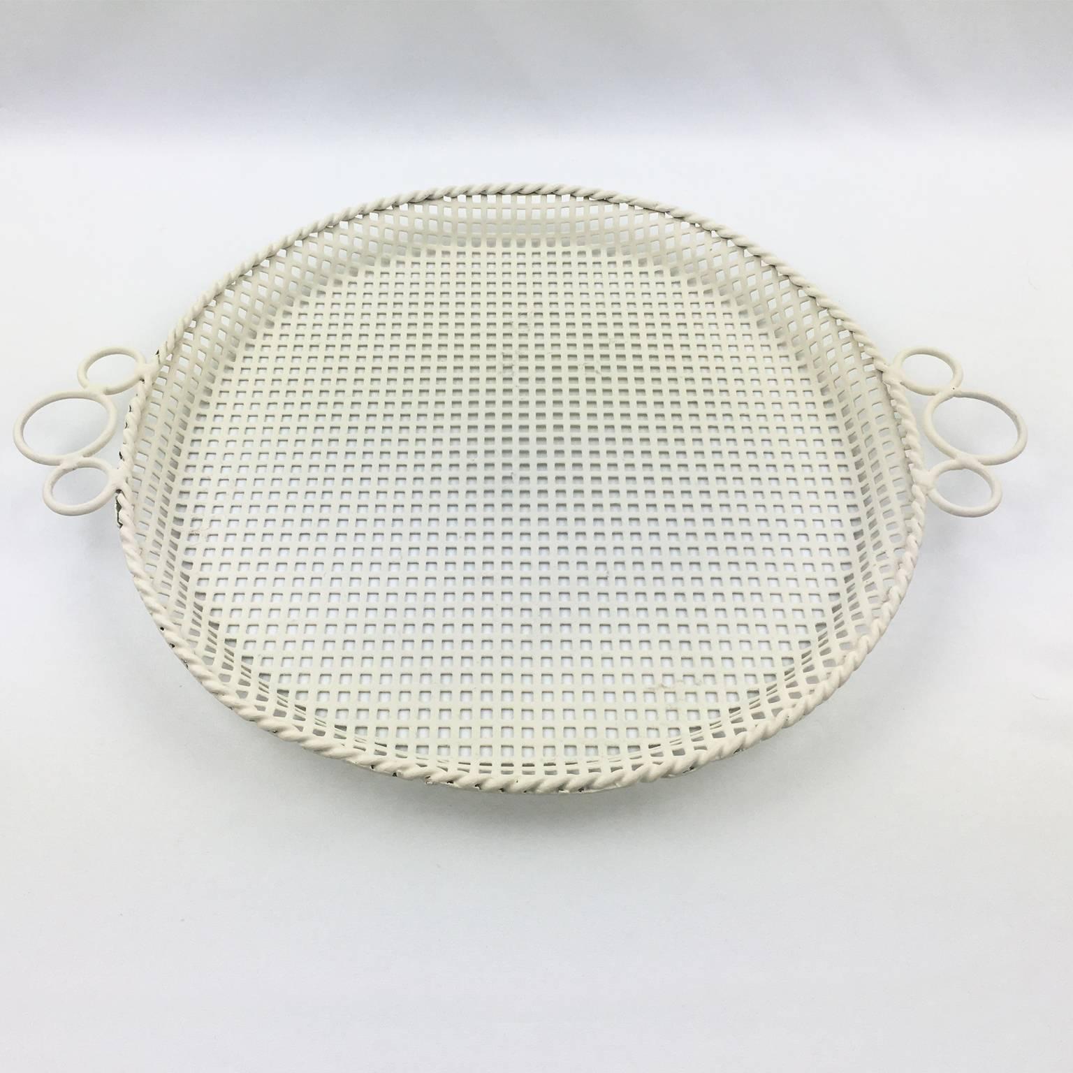 Very nice large barware serving tray in the manner of French designer Mathieu Mategot. A striking example of French, 1950s metalwork. Mid-Century modernist shape, featuring folded and perforated off-white lacquered metal round serving tray platter.