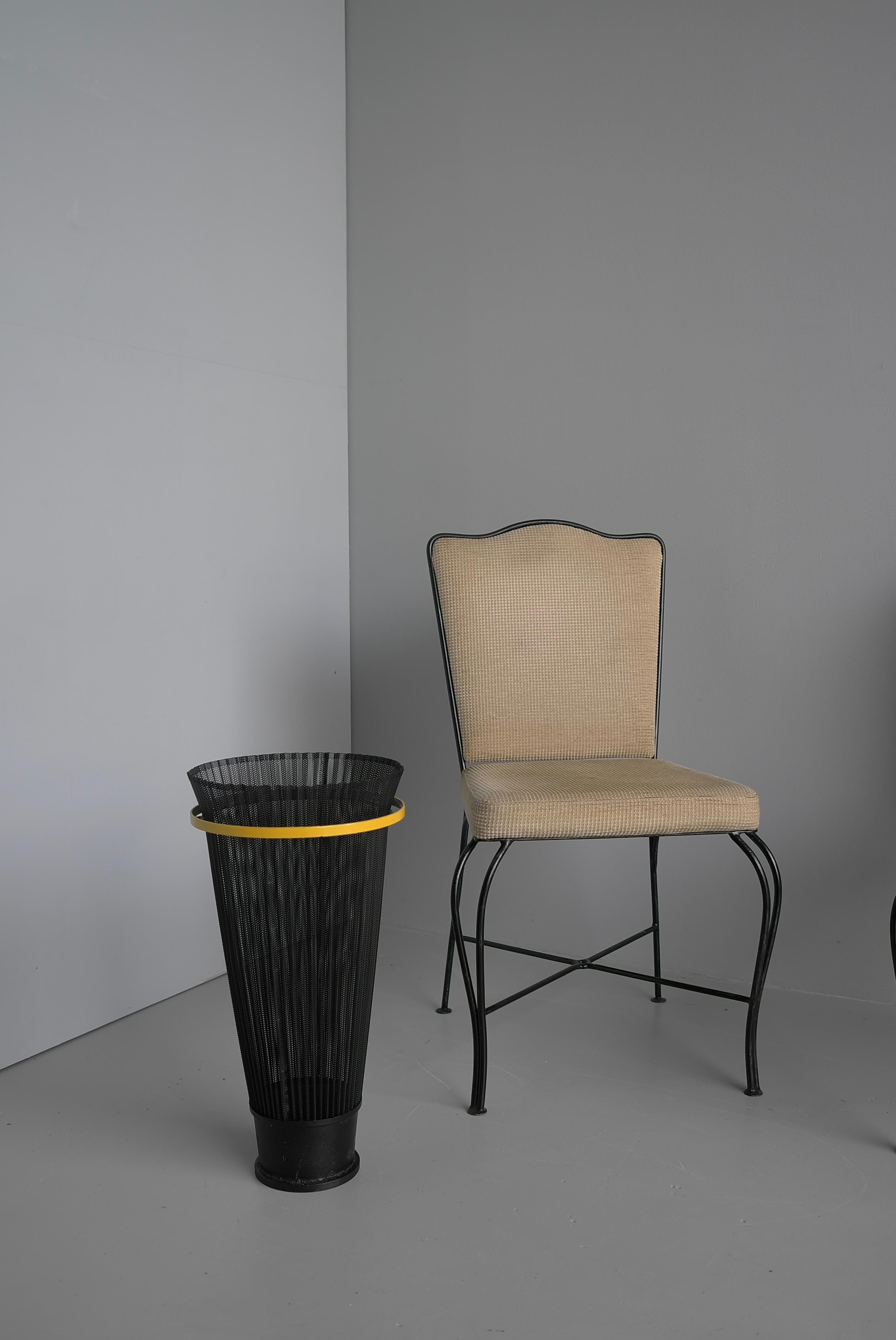 Black and Yellow Mathieu Matégot umbrella stand, Rigitulle, Atelier Matégot, France, 1950s. 