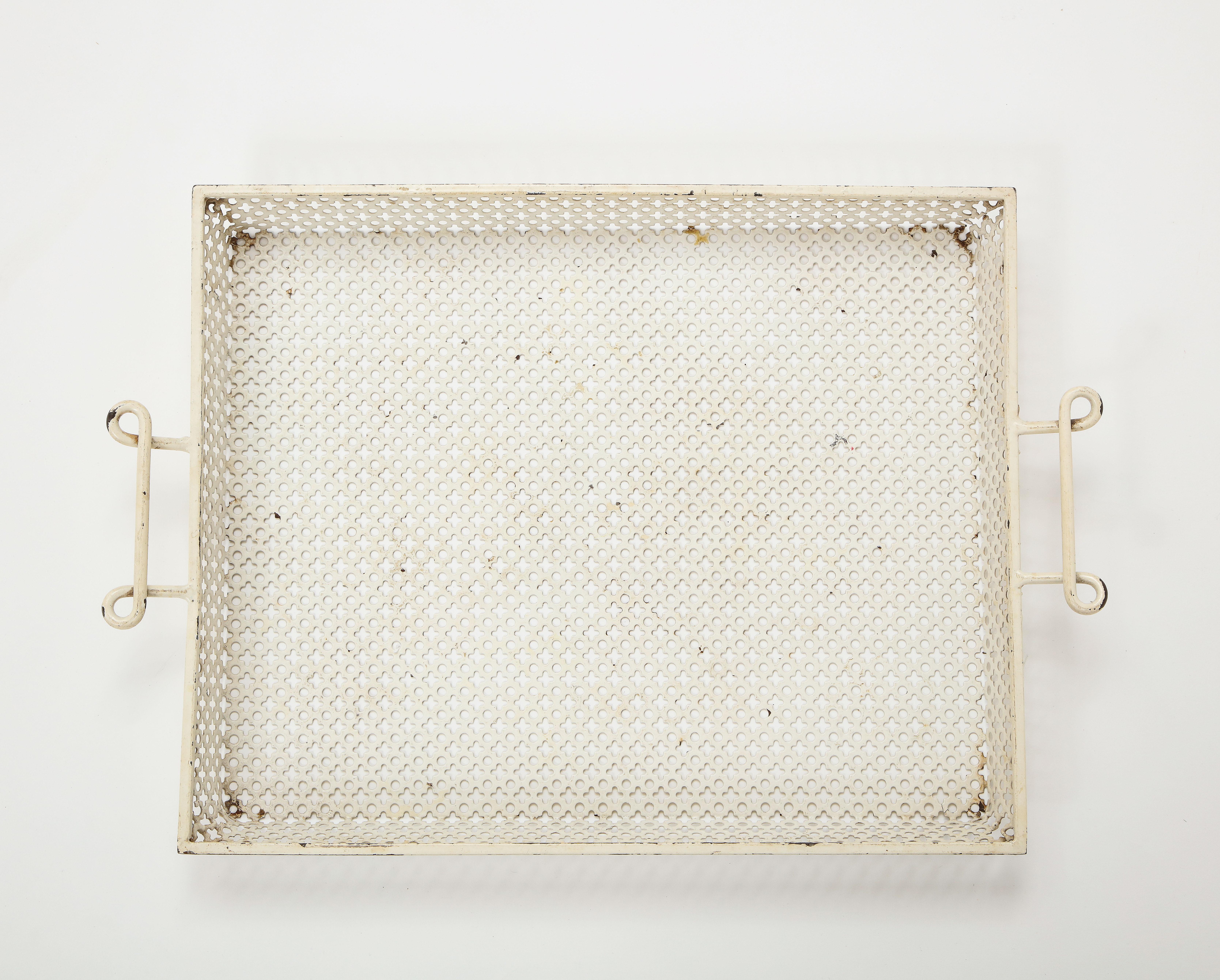Mathieu Mategot (1910-2001),white lacquer clover perforated serving tray, France, c. 1950
Metal, (not repainted, excellent condition, rare handle)
H: 1.75 W: 13.75 L: 16.5 (w/ handles 19.75) in.

Bibliography: Patrick Favardin, Mathieu Matégot,