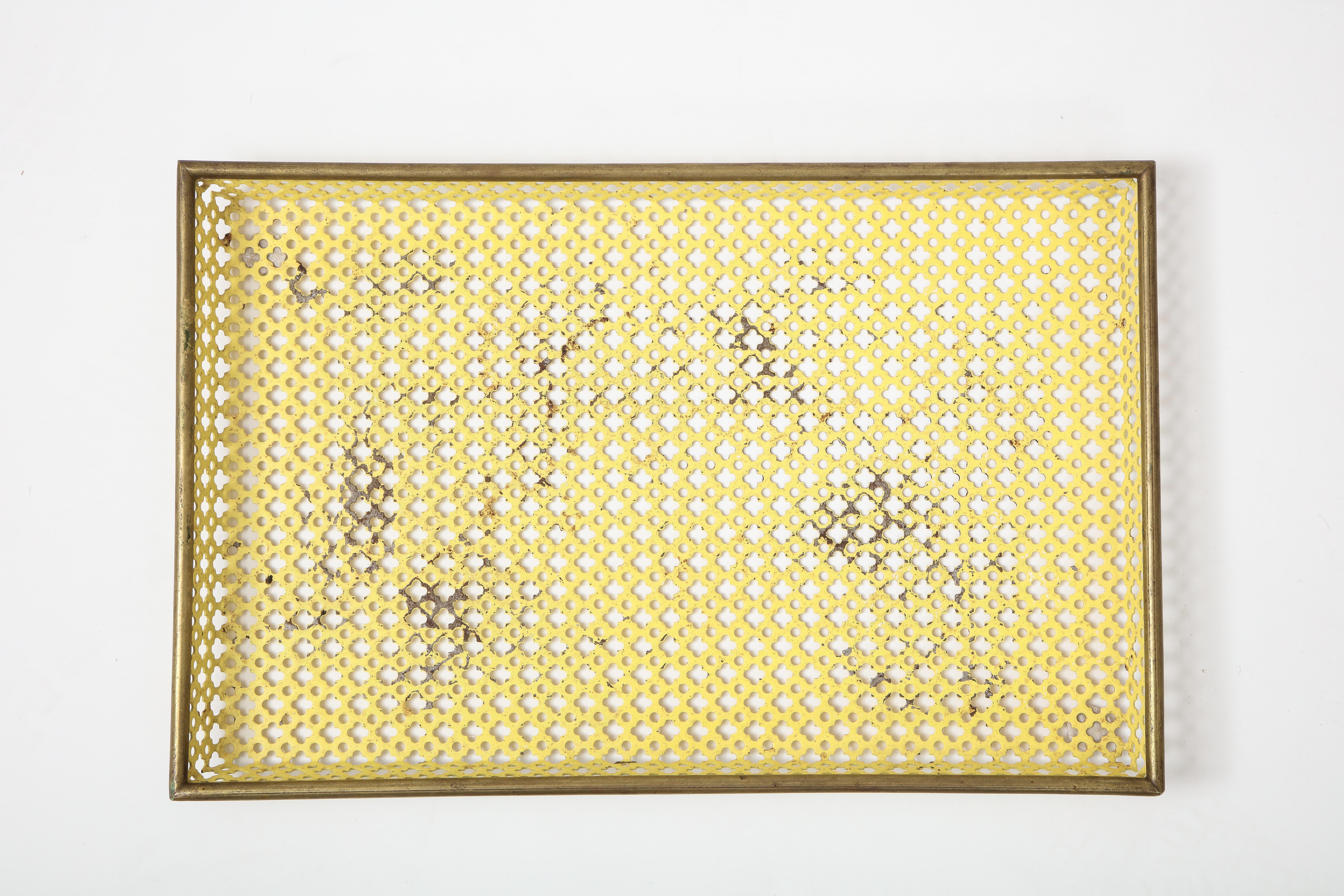 Mathieu Matégot (1910-2001)
Yellow Tray, France, c. 1950
Perforated Metal, brass rod detail, enamel
Measures: H 1.5 D 11.5 W 17.25 in.

Provenance: Collection of an architect, France

Bibliography: JOUSSE ENTREPRISE, 