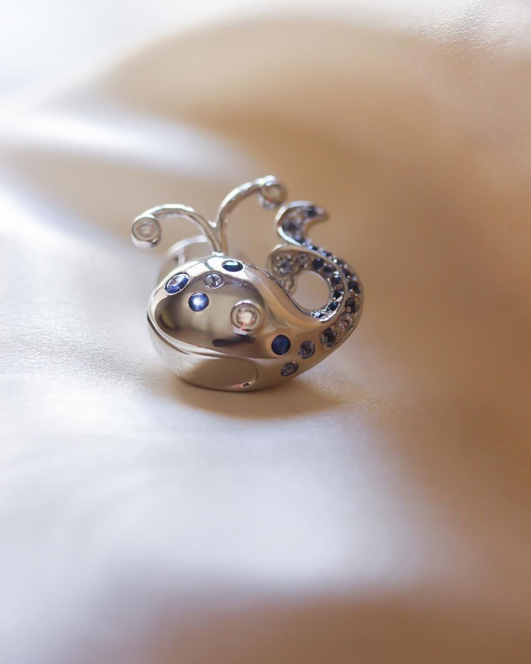 Contemporary Mathon Paris Diamonds Blue Sapphires White Gold Pin's For Sale