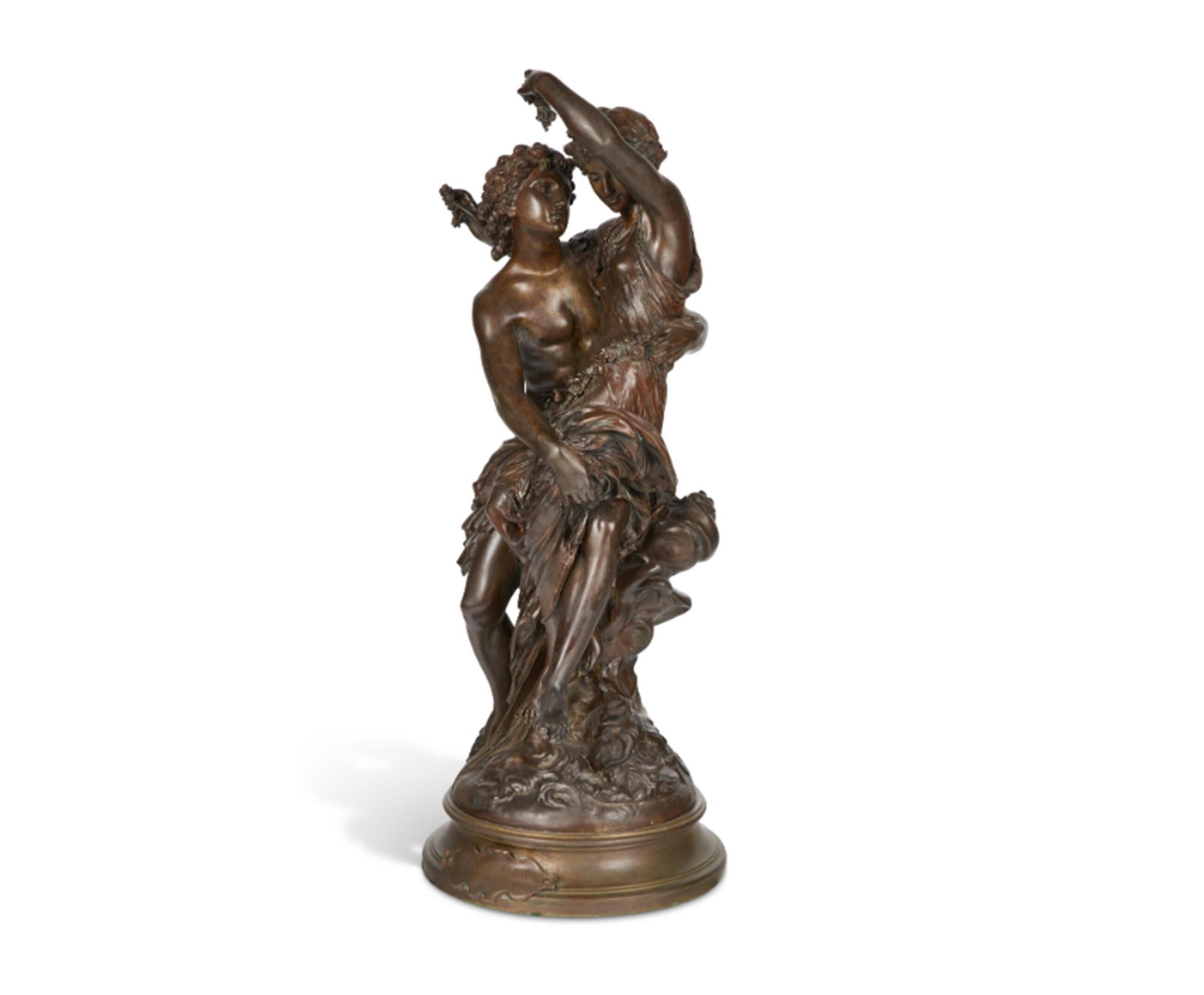 Patinated bronze figural statue depicting Zephyrus, god of the west wind, as he embraces his bride Flora. The couple are seen draped in flowers as if they have just married.
Flore et Zephyr
Signed 'Mthrin Moreau' (to the base), rotating socle