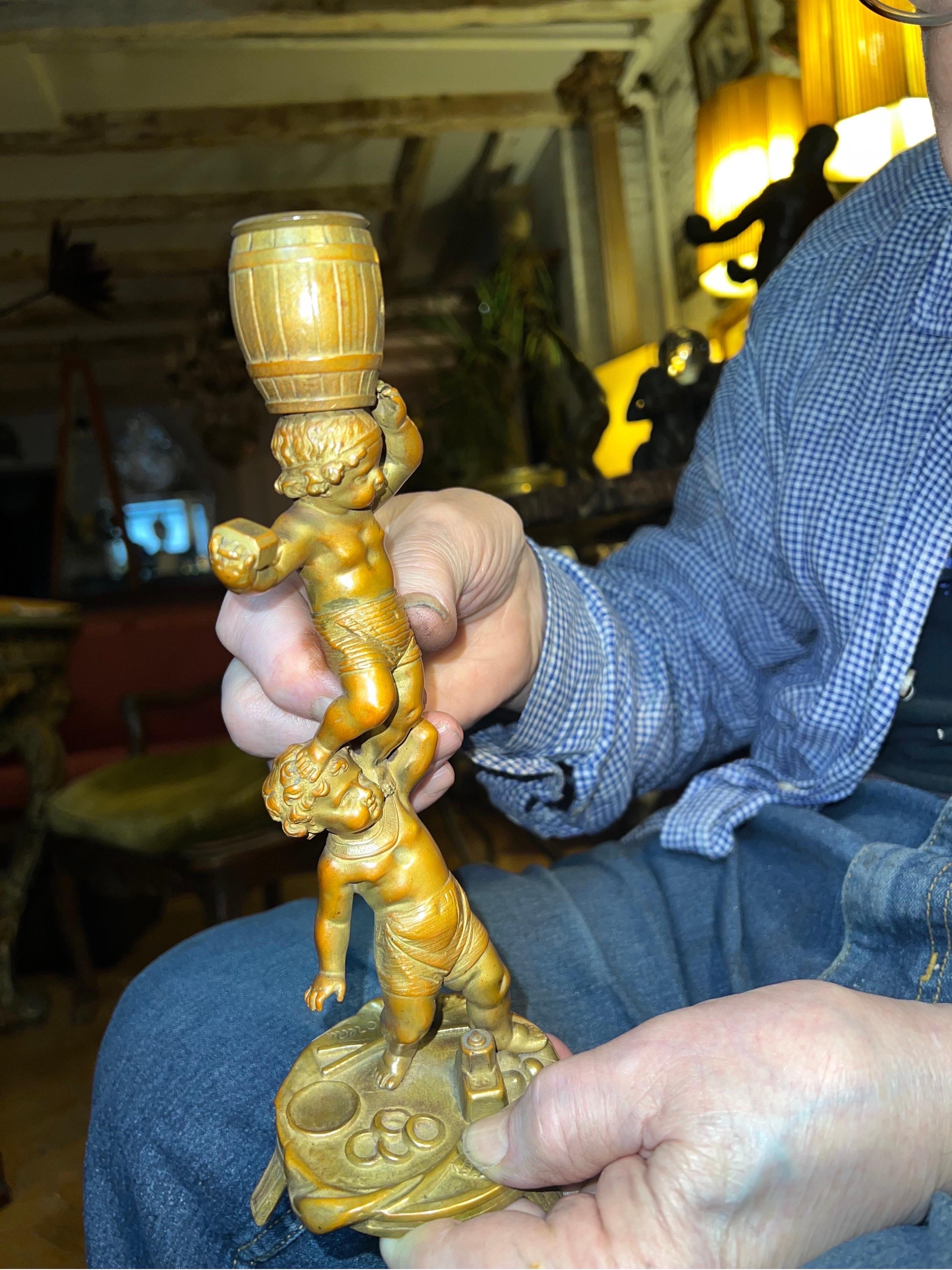 Mr. Giallo is opening his personal vault to sell a collection of his treasured antiques he's held on for so long.

ABOUT ITEM
Mathurin Moreau Patinated Bronze “Circus” Candlestick Holder Pair Signed at base. Fun candlestick pair of what is set to