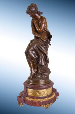 19th Century sculpture of seated Female Nymph in Bronze, with red Marble Base