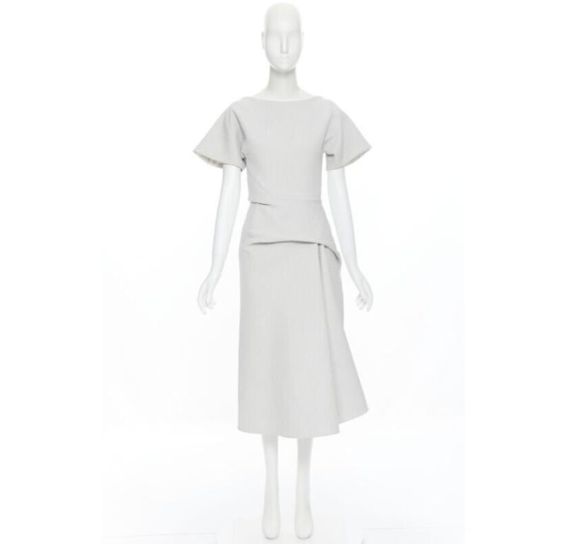 MATICEVSKI 2017 Meta Vestido gris claro drapeado con cintura fruncida UK6 XS
Referencia: LNKO/A01712
Marca: Maticevski
Colección: 2017
Material: Algodón
Color: Gris
Patrón: Sólido
Cierre: cremallera
Detalles adicionales: Tejido cloque. Cintura