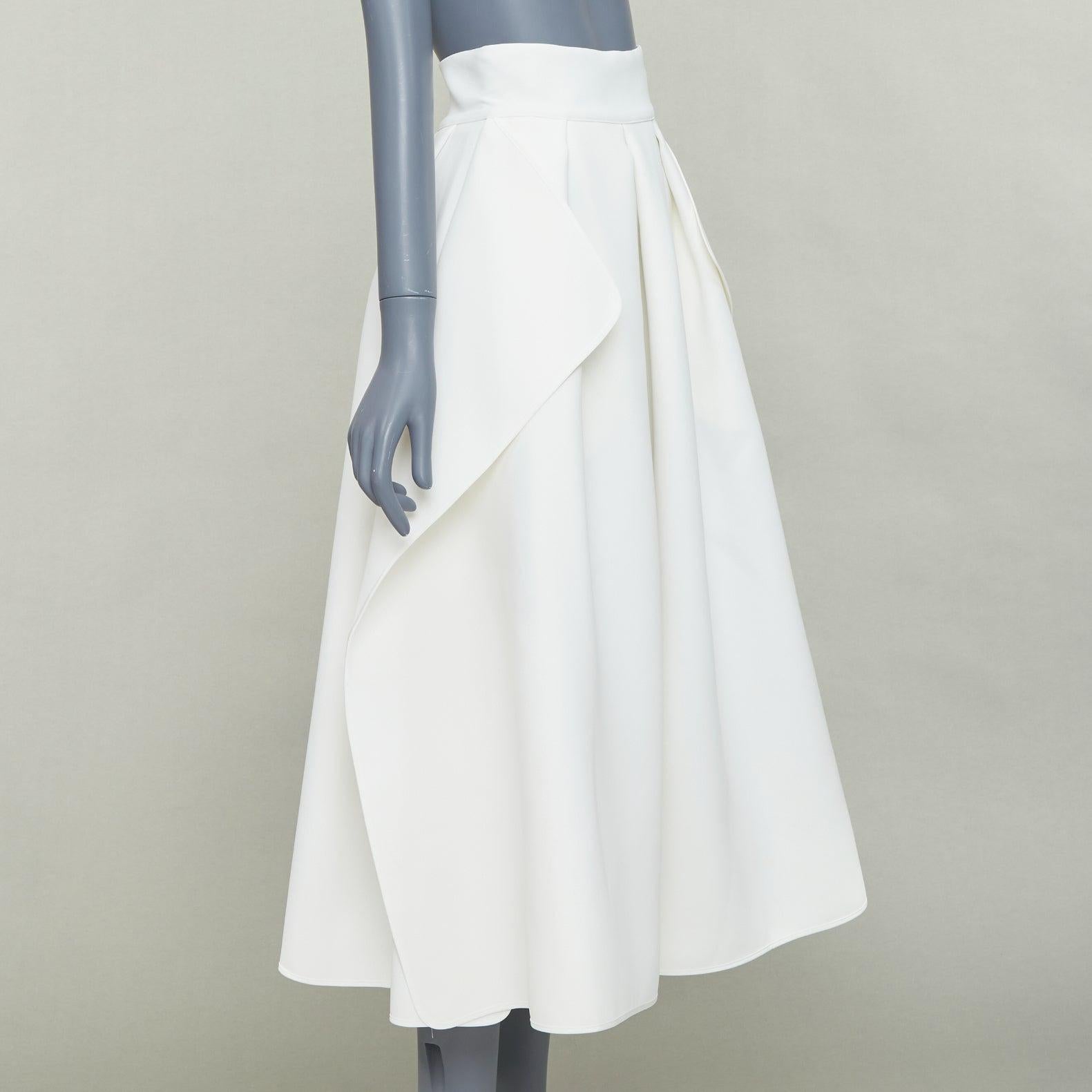 MATICEVSKI 2020 Fondness cream crepe pleated front drape hi low full skirt AU8 S
Reference: SNKO/A00578
Brand: Maticevski
Model: Fondness
Collection: AW 2020
Material: Polyester
Color: Cream, Bronze
Pattern: Solid
Closure: Zip
Made in: