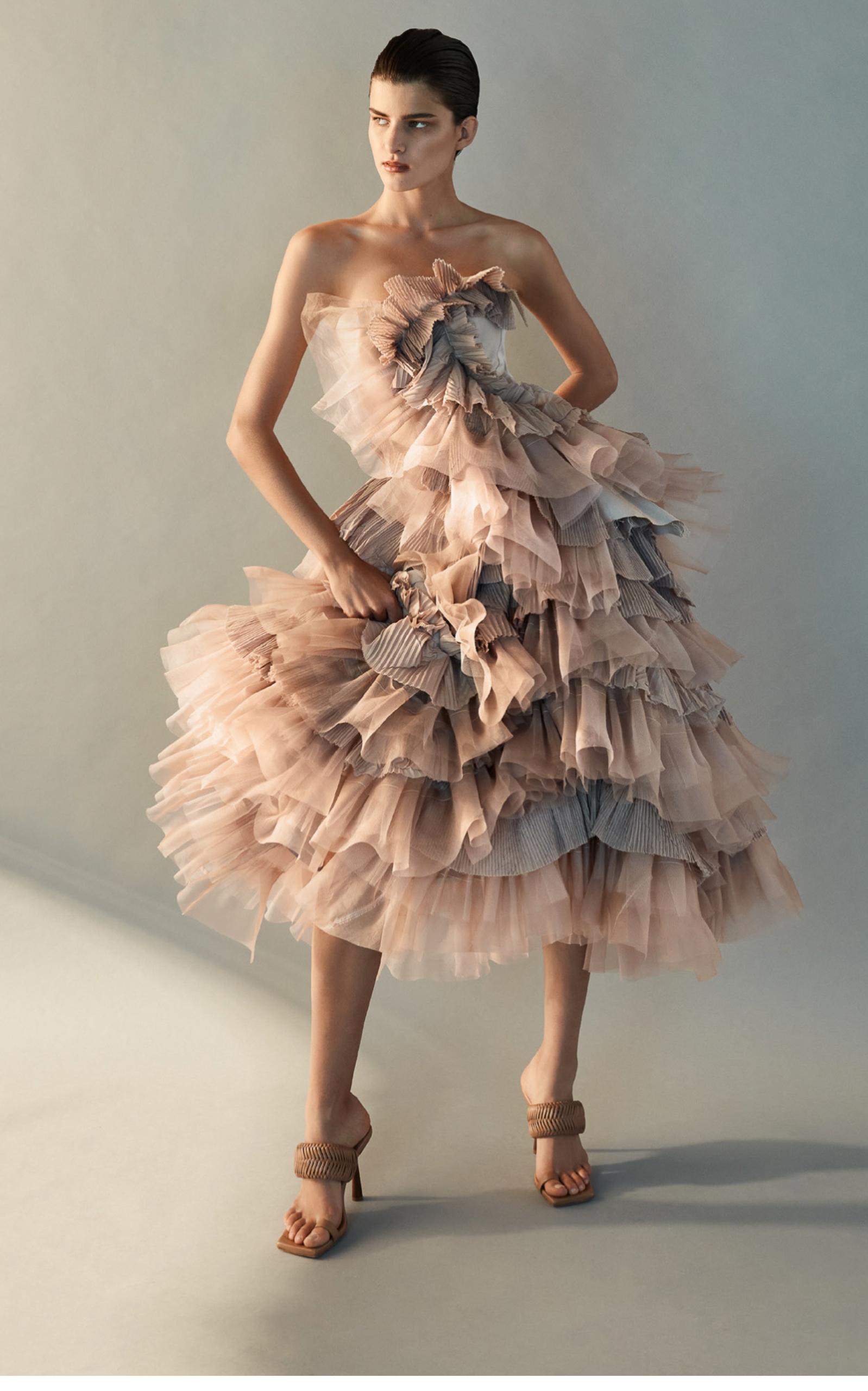 FOLLOW US @RUNWAYCATALOG
Petal Ruffled Bustier by Maticevski has details in artful, dramatic proportions like sculptural bows and bold ruffled layers. 
Strapless with a sweetheart neckline, this mixed-media ruffled top is a statement piece.
Zip
