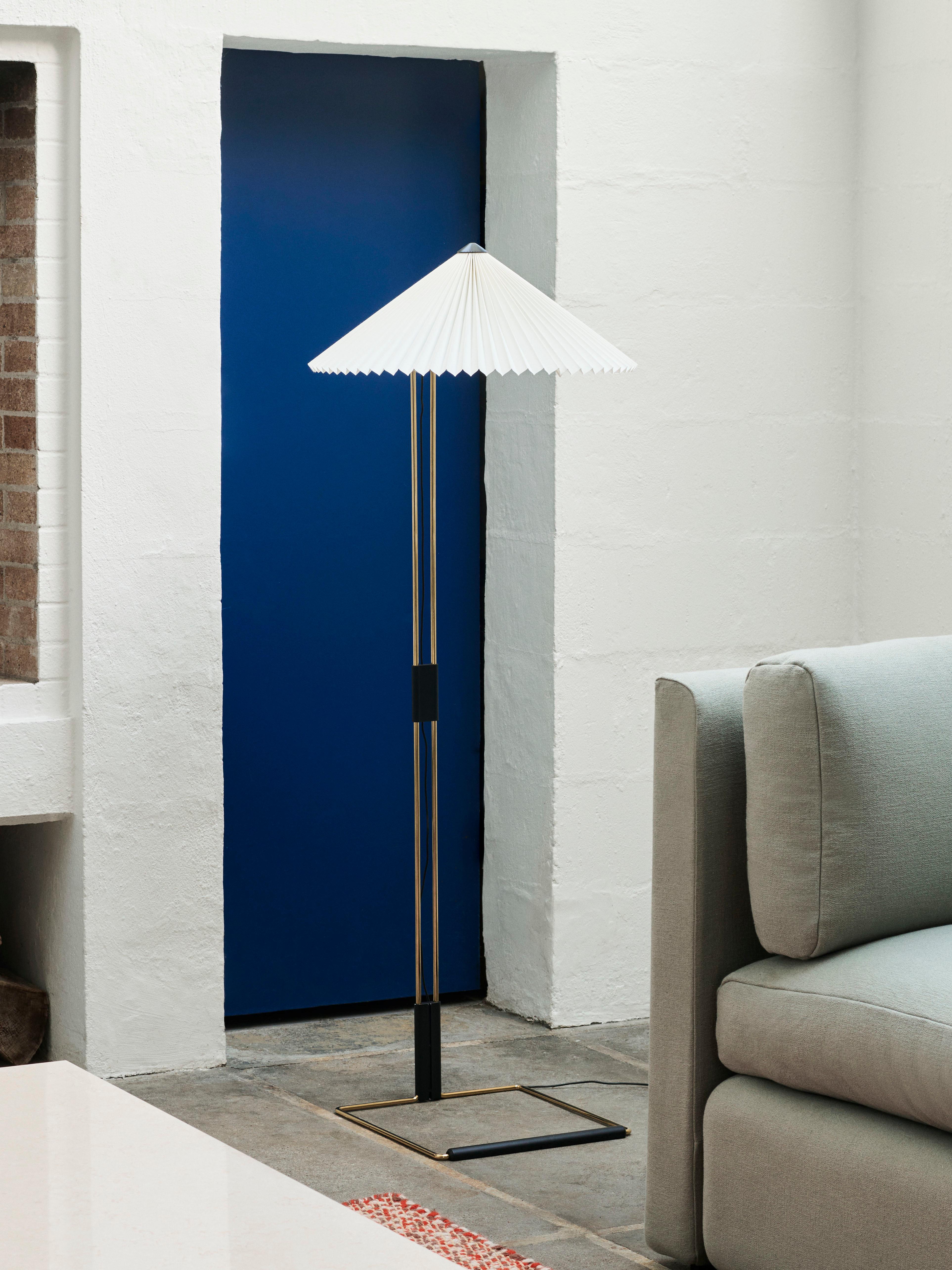 The Matin Floor Lamp offers a contemporary yet poetic design, with a construction that combines visual delicacy with physical robustness. 

The flat-packed design consists of a slender polished brass steel frame complemented with matte black