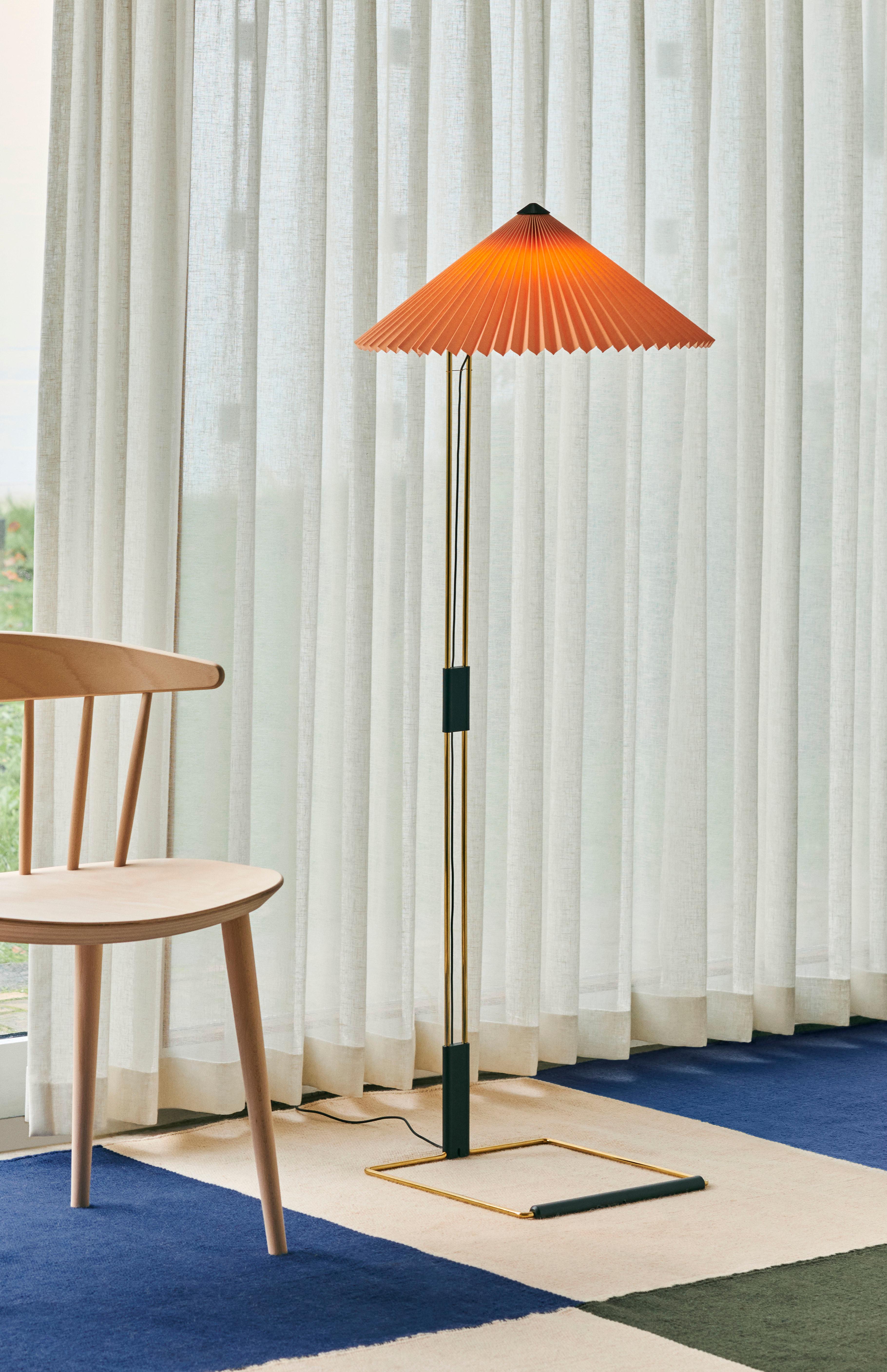 The Matin Floor Lamp offers a contemporary yet poetic design, with a construction that combines visual delicacy with physical robustness. 

The flat-packed design consists of a slender polished brass steel frame complemented with matte black