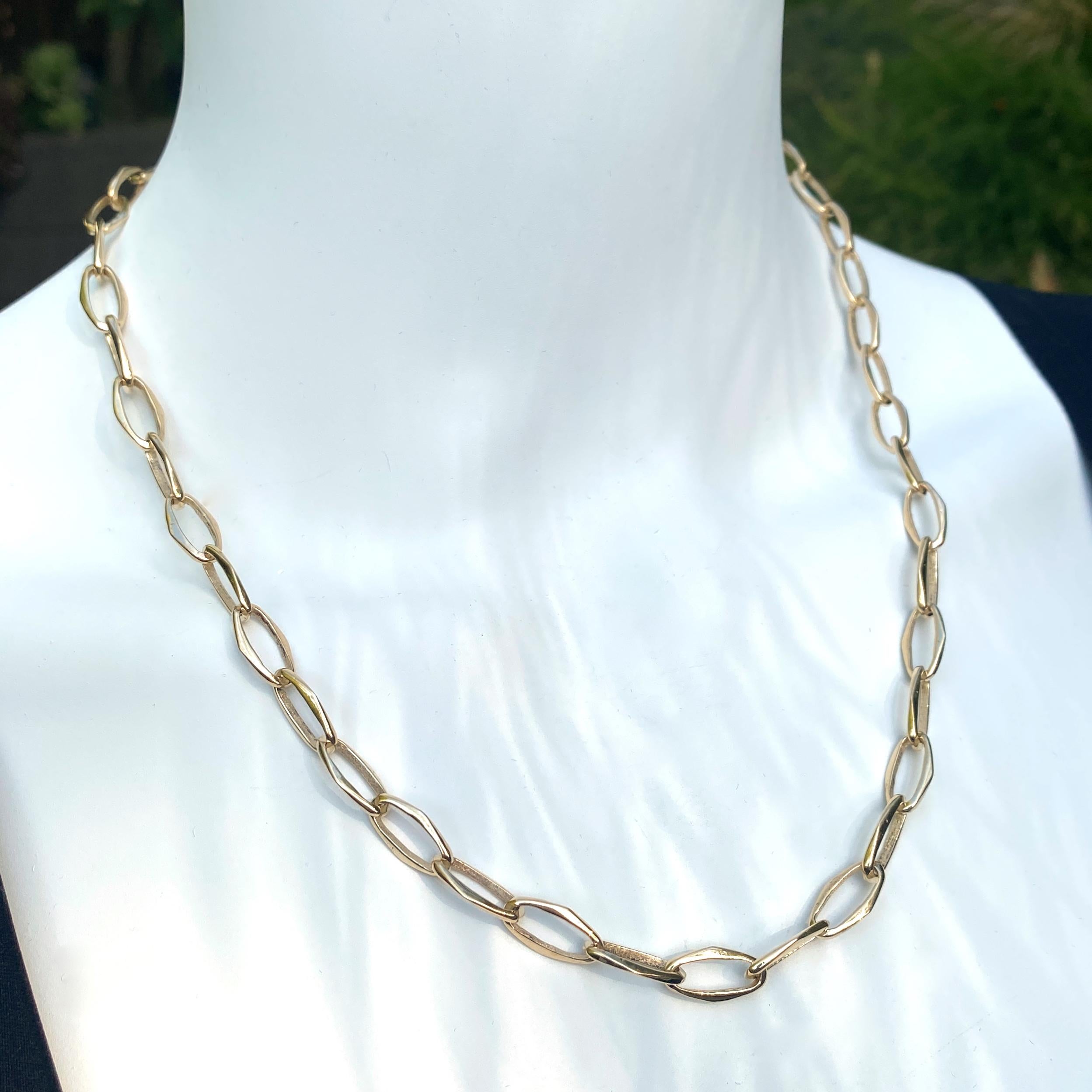 This unusual chain was crafted here in our shop by Eytan Brandes and features oval links that  bulge at the sides to form gentle points.

The closure is a small toggle mirroring the navette shape of the links.  

A gorgeous, one-of-a-kind piece In