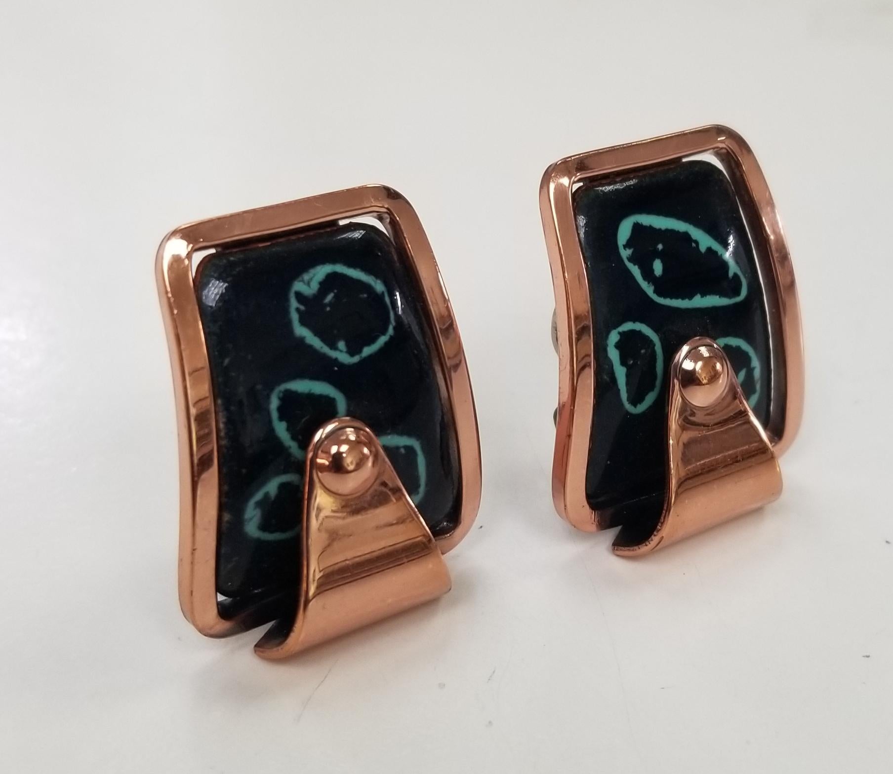 Rare vintage 1950s abstract modernist enamel on copper earrings by Matisse of California. Outstanding  design to the enamel in black and abstract design. The earrings measure 1
