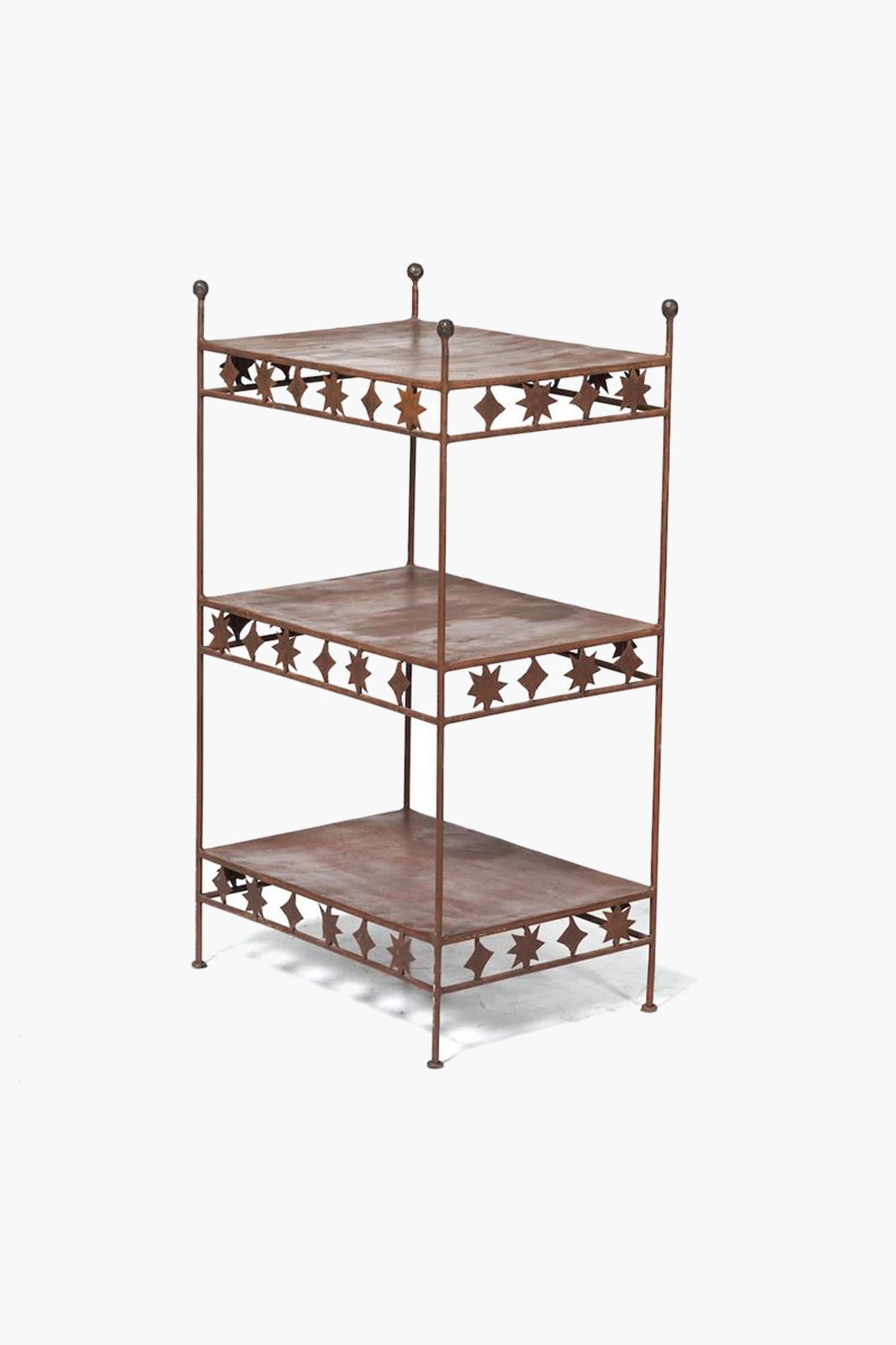 Matisse' Wrought Iron Etagere, 1960s

Patinated wrought iron etagere with whimsical Matisse style cut-out decoration supporting each tier.

1960s, France.

Condition: Patinated to a brown bronze color with age.