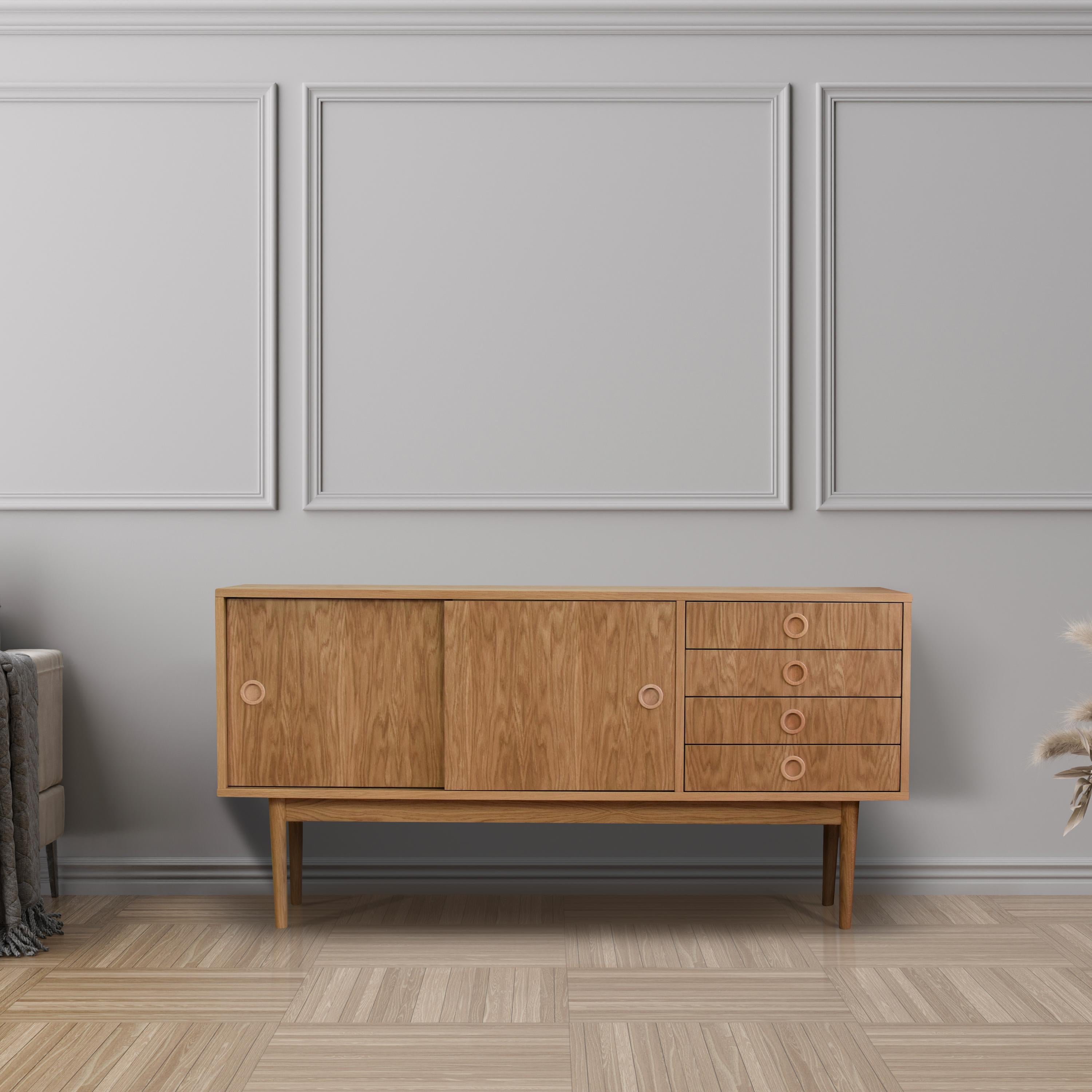 Grande commode Mato par Pastform
Dimensions : D 40 x L 190 x H 75 cm.
MATERIAL : Bois teinté et verni.

Disponible en différentes couleurs de bois : Whisky, Rhum, BPA, Nobel, Brandy, Schwarz et Natura. Disponible en trois largeurs différentes :