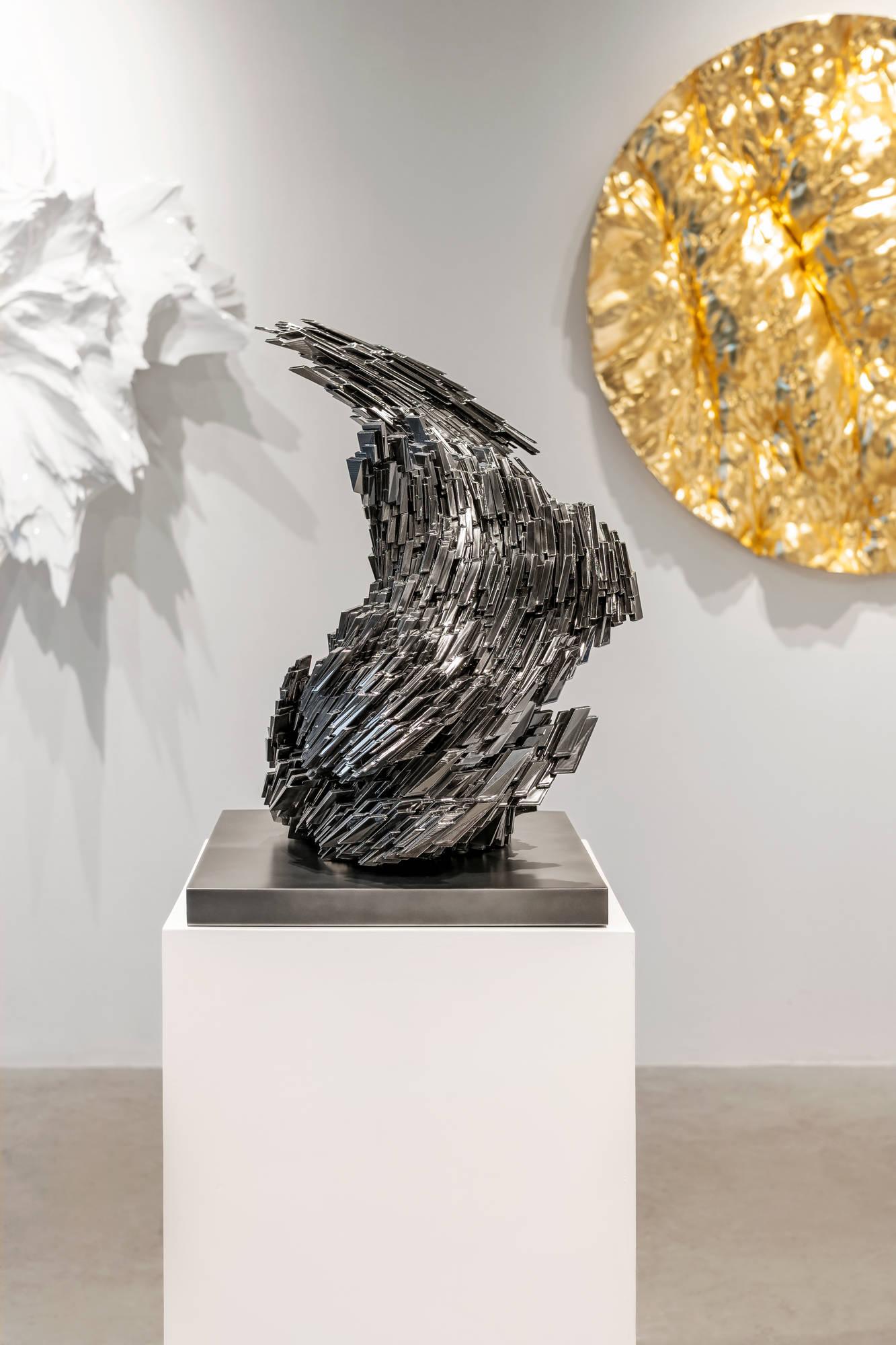 Matrix 01 is a study in controlled chaos—an eruption born from order. At its core lies the most elemental of forms: the cube. Multiplied, manipulated, and pushed to its limits, this modular building block fractures outward into an intricate skin of