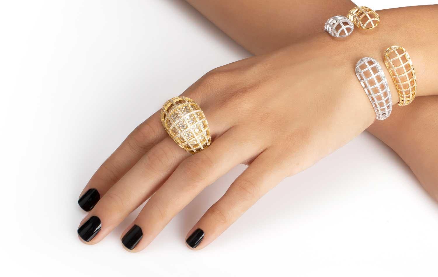 ‘Matrix’ is a complex ring inspired by a feature about Beirut and its “Joie De Vivre”- against all odds. “Confined within a ribcage encrusted in the brilliance of the diamonds a primary ring stands resilient and shines through exactly how it should