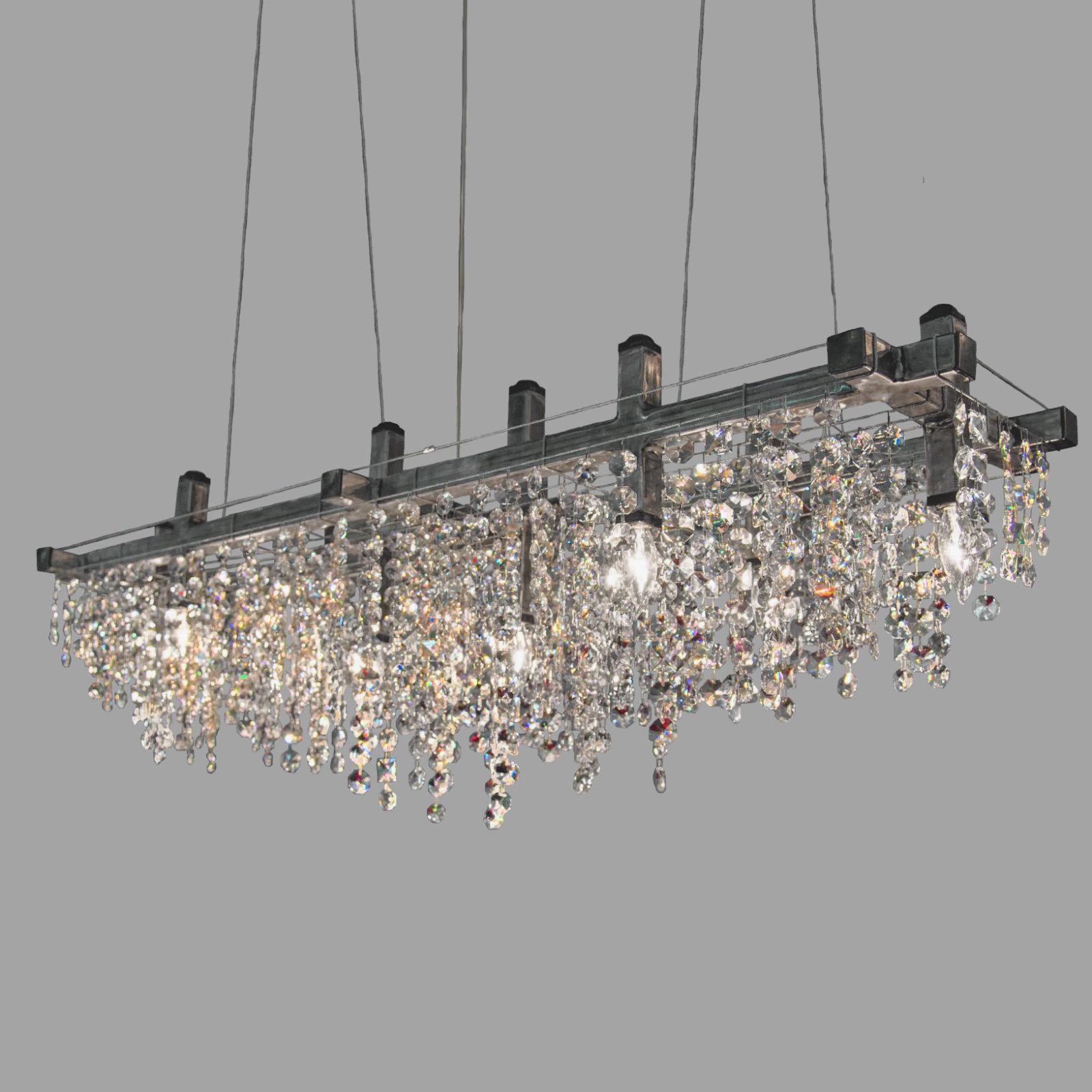 Matrix crystal linear suspension chandelier by Michael McHale.
Dimensions: D 23 x W 107 x H 45.5 cm.
Materials: steel, optically-pure gem-cut crystal.

8 x candelabra base CA7 bulb, either incandescent or LED

All our lamps can be wired
