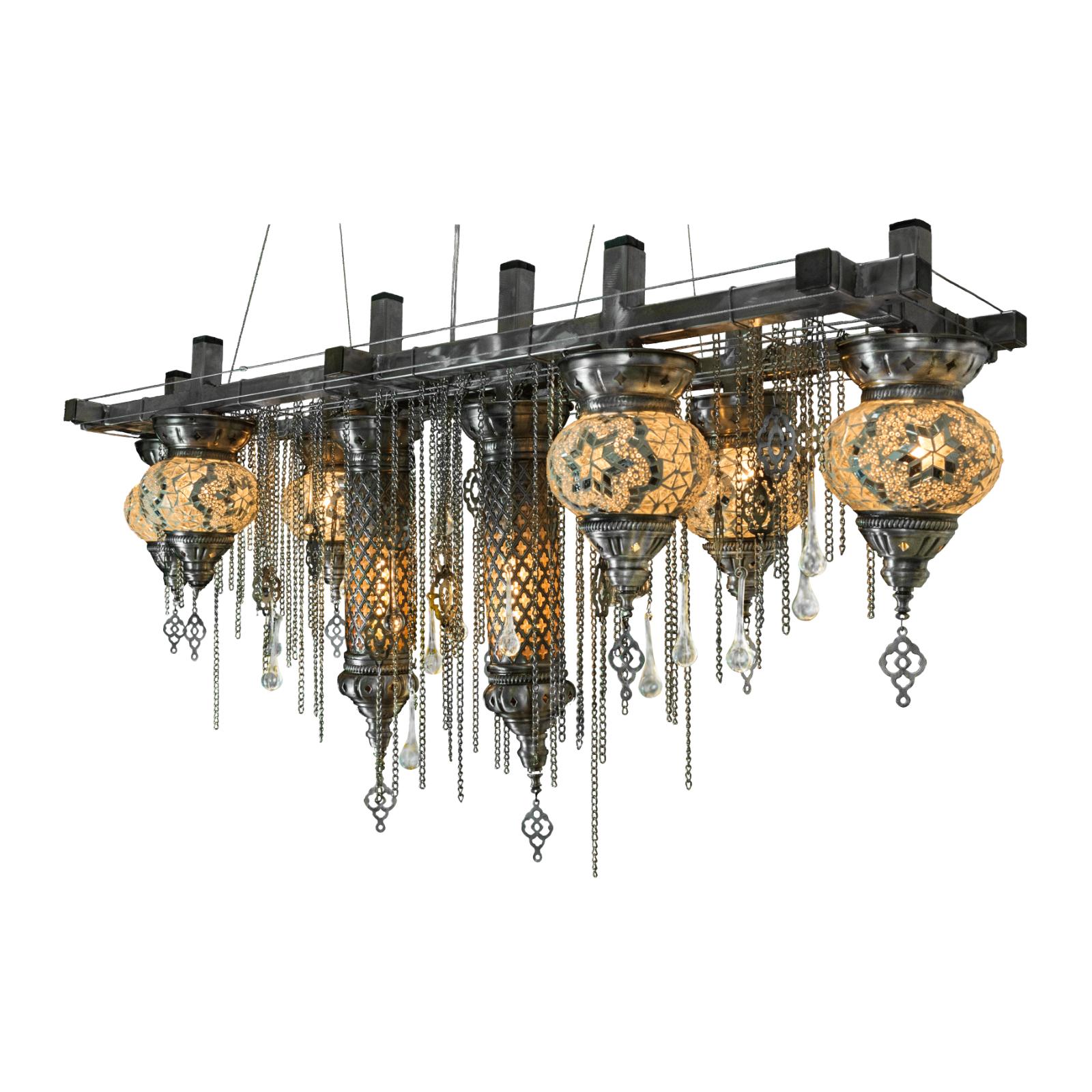 Matrix Istanbul linear suspension chandelier by Michael McHale
Dimensions: D 23 x W 107 x H 45.5 cm.
Materials: Steel, glass, chain, crystal.

8 x candelabra base CA7 bulb, either incandescent or LED.

All our lamps can be wired according to