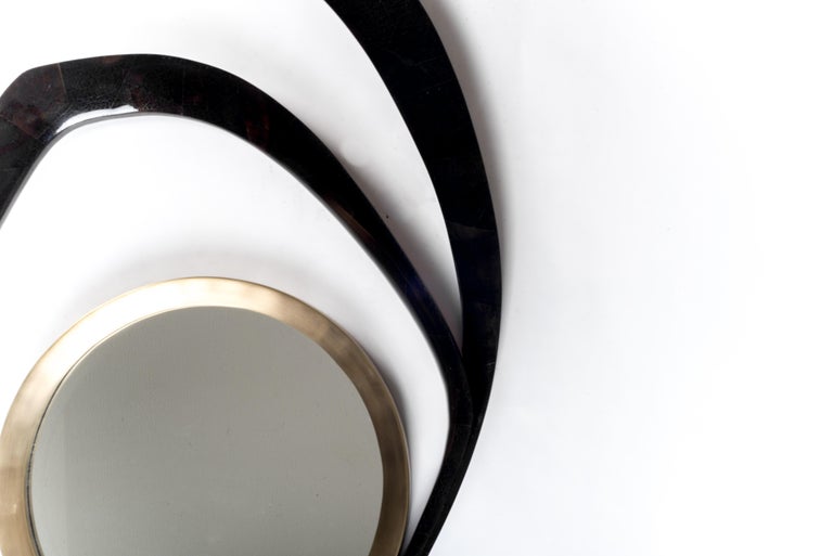 The Matrix mirror is edgy in it’s design and makes for a bold piece. This mirror can be hung in 3 different ways. This piece is inlaid black pen shell, a cream shagreen version is also available (see image at end of the slide). Each piece of shell