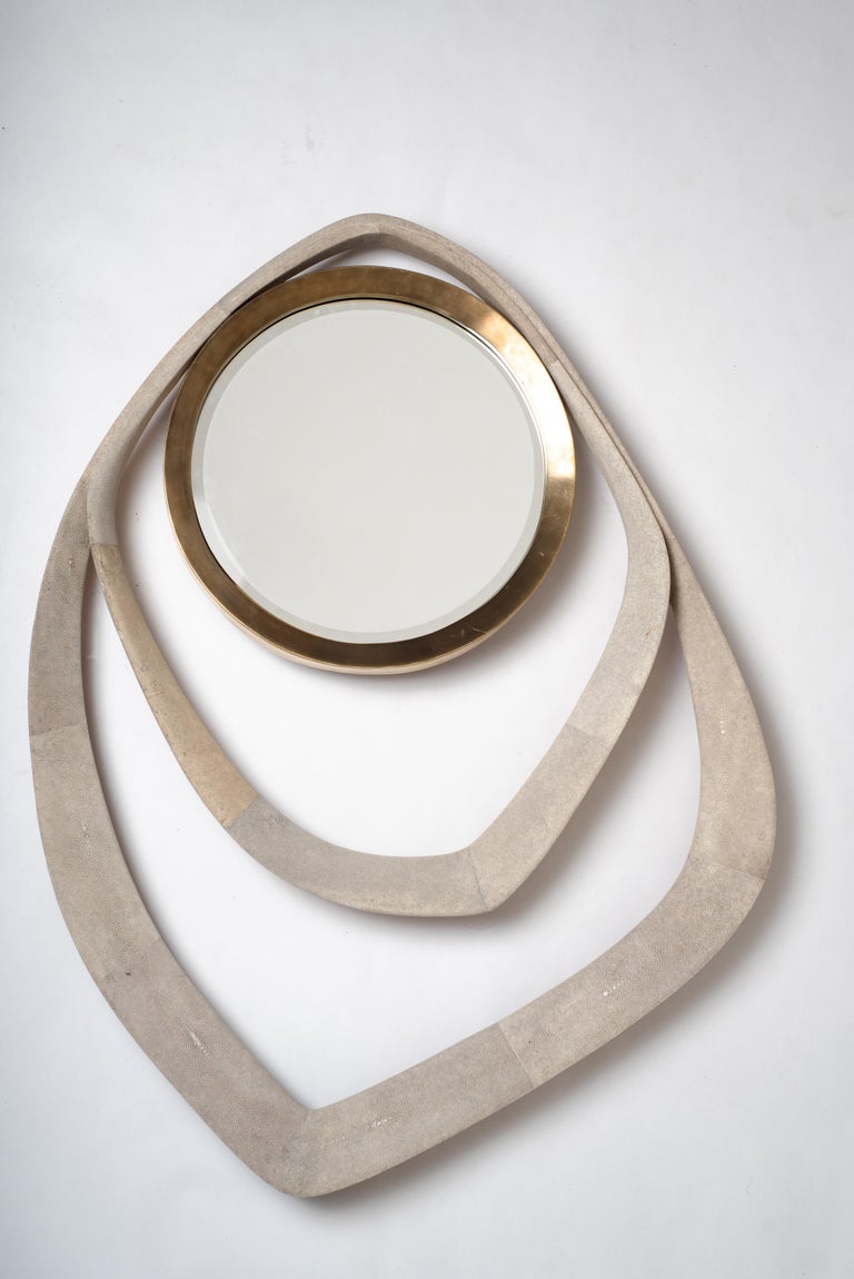 The Matrix mirror is edgy in it’s design and makes for a bold piece. This mirror can be hung in 3 different ways. This piece is inlaid the cream shagreen, a black pen shell version is also available (see image at end of the slide).

The finish of