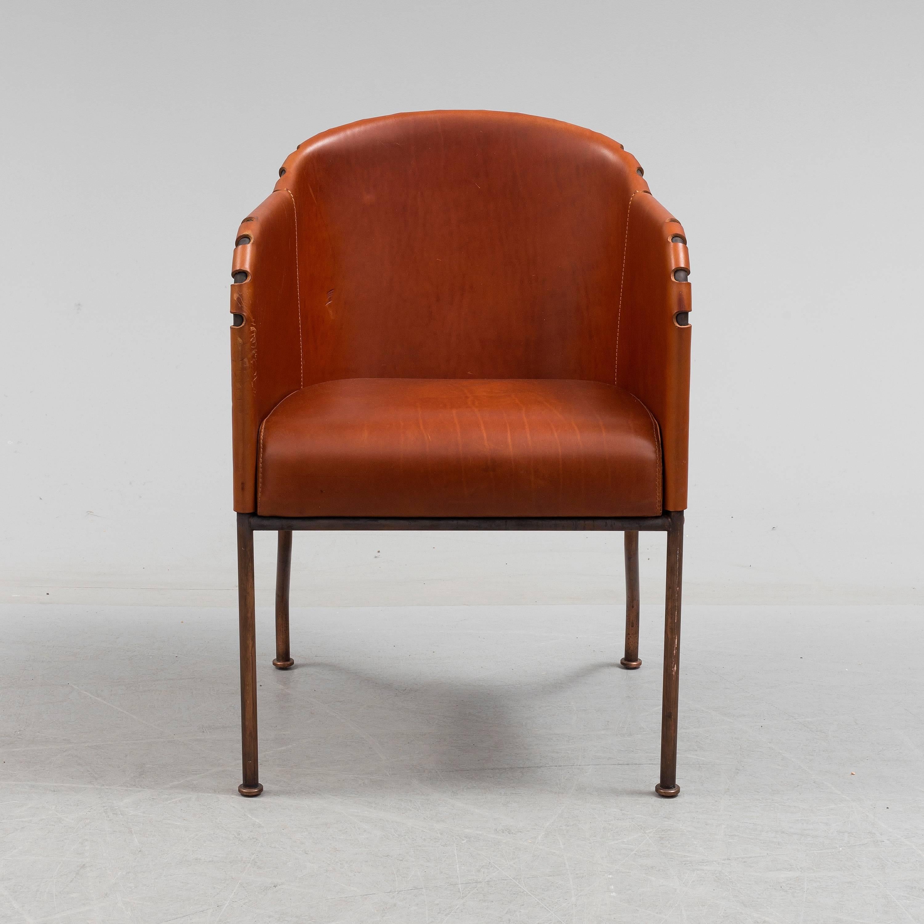 Mats Theselius pair of 'Ambassad' armchairs for Kallemo Sweden, designed and produced in 1999. Made in copper frame and brown Elk leather. 
Six (6) chairs available. Price is per chair.
