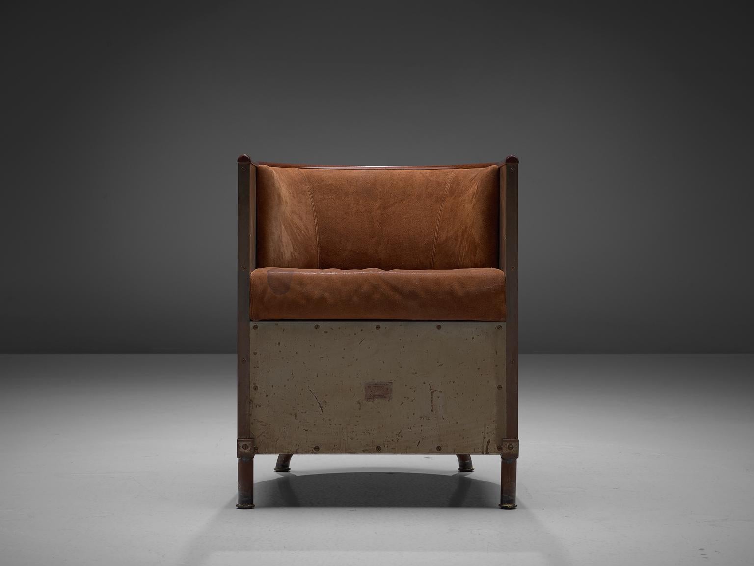 Mats Theselius for Källemo, Järn/Mocca Fätöljen chair edition 05/360, cognac suede, wood and steel, Sweden, 1994.

This chair is named the Jarn/Mocca chair, which means iron / mocca, referring to the material and colors in this design. The chairs