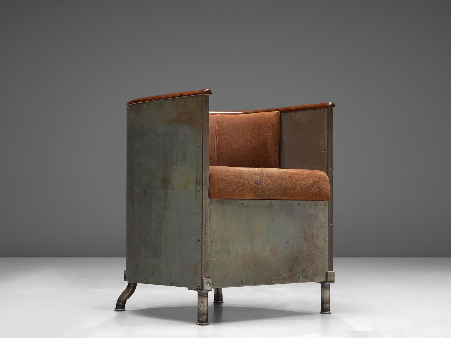 Mats Theselius for Källemo, Järn/Mocca Fätöljen chair edition 101/360, cognac suede, wood and steel, Sweden, 1994.

This chair is named the Jarn/Mocca chair, which means iron / mocca, referring to the material and colors in this design. The chair