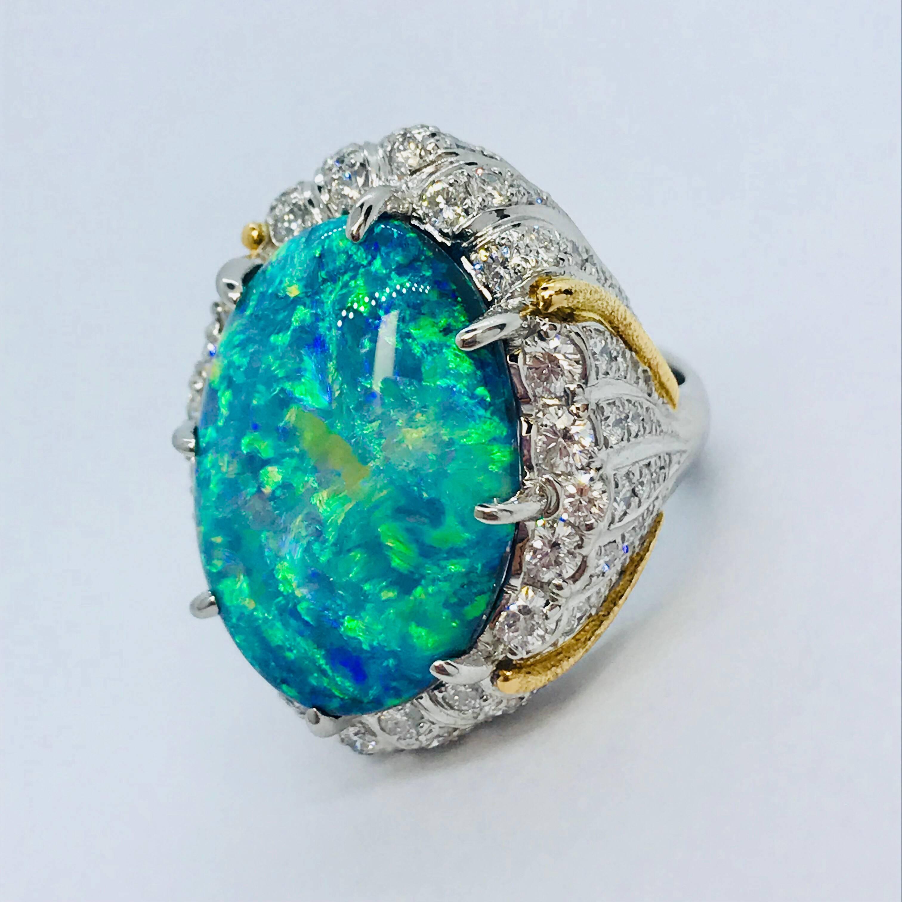 All buyers outside of Japan will receive -8% tax exemption from the list price. 
Please inquire for details.
FREE SHIPPING for this item.
Black Opal : 20.35ct / Diamonds : 3.00ct 
Approximate Size of the center stone : L23.5mm W16.5mm
Size : JP 14 /