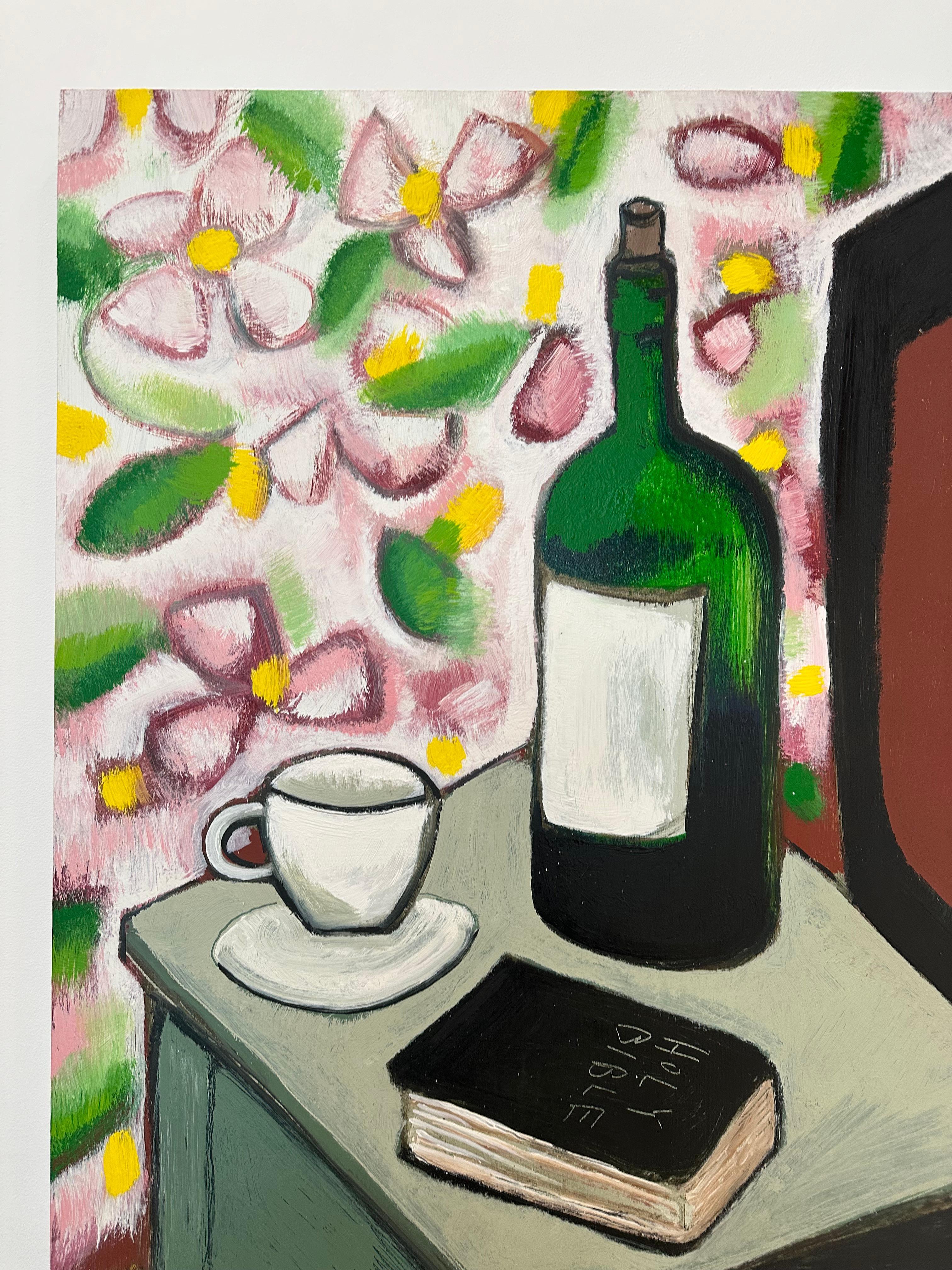 In this contemporary still life painting in oil on panel, a fisherman's bedside table has a dark green wine bottle, mug, and bible arranged against a bright, lively floral patterned botanical wallpaper in green, yellow, mauve and white. Signed on