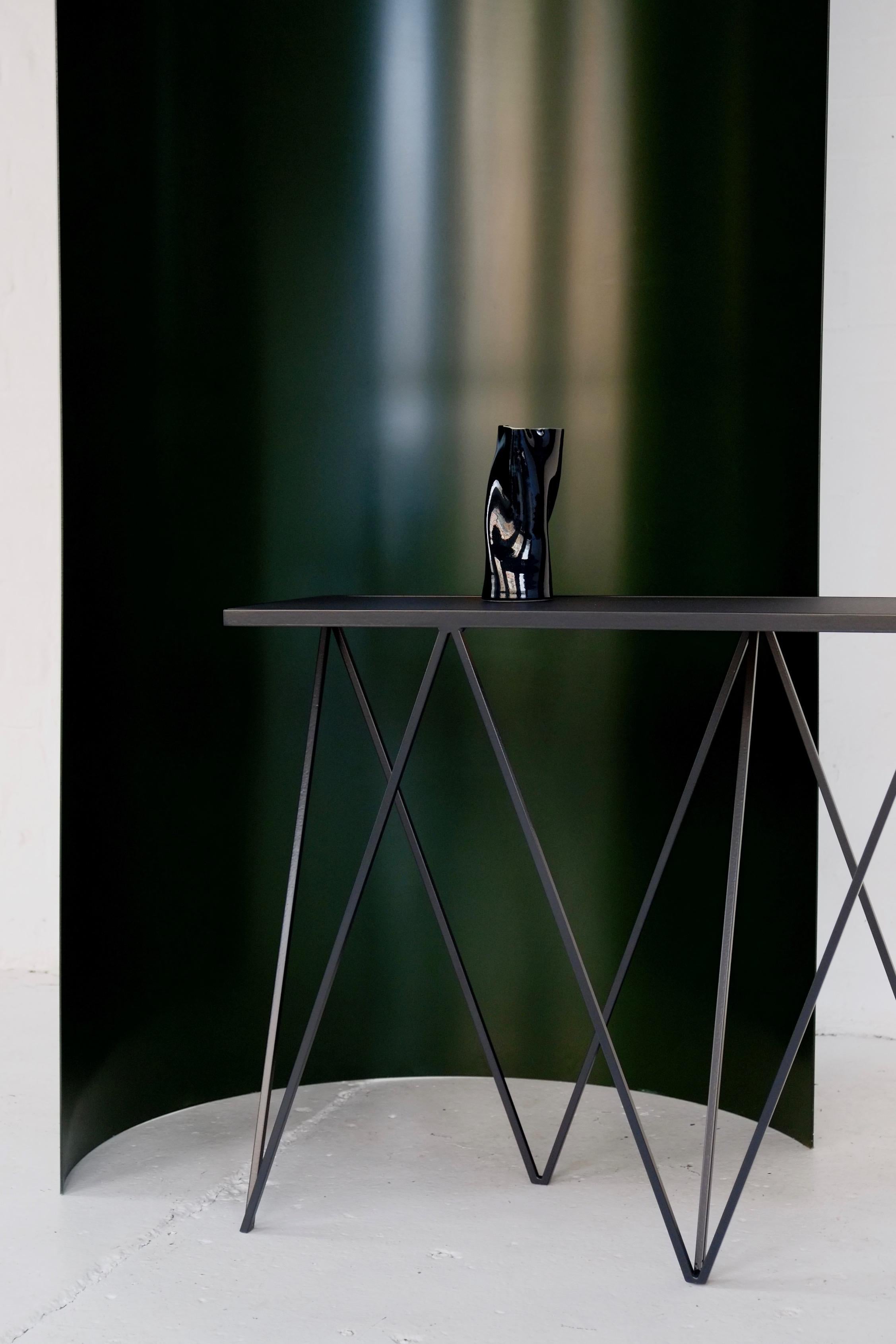 Welded Charcoal Black Giraffe Console Table with Linseed Linoleum Table Top For Sale