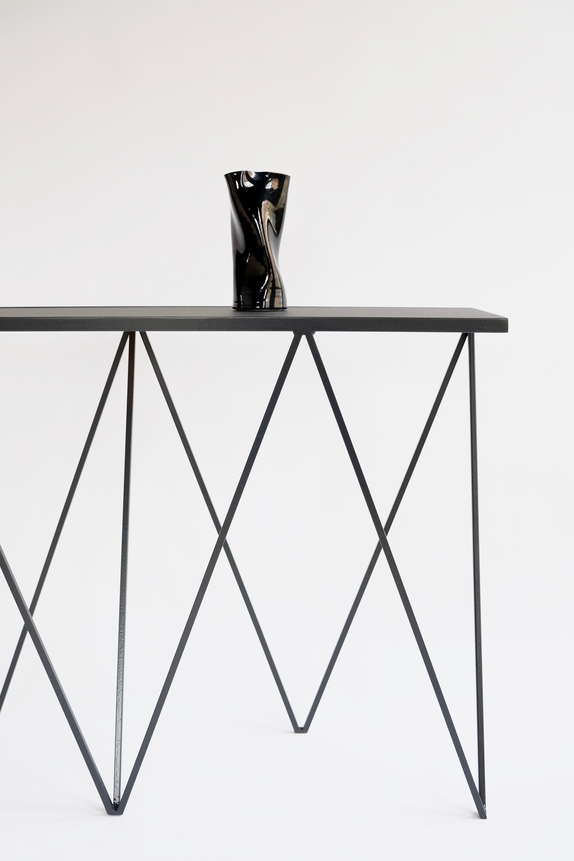 Steel Charcoal Black Giraffe Console Table with Linseed Linoleum Table Top For Sale