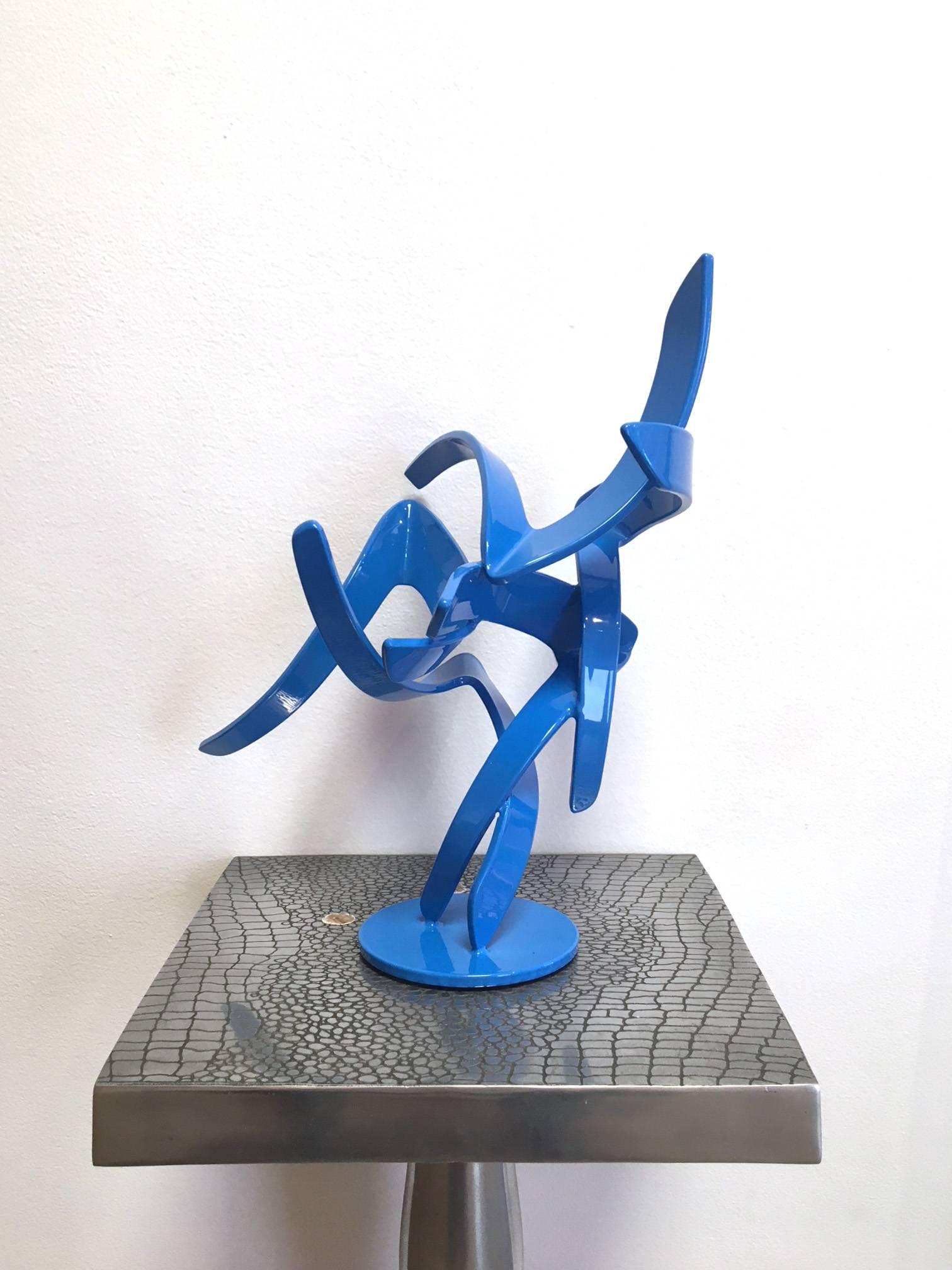 Matt Devine 
Studio Study 18-25
Abstract Steel Sculpture with Blue Powdercoat (Freestanding Sculpture)
13 x 10 x 9 in
$2,200.00

Matt Devine is a self-taught sculptor working with steel, aluminum and bronze. Born and raised in Salem, Massachusetts
