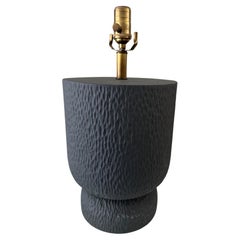 Matte black chiseled plaster lamp