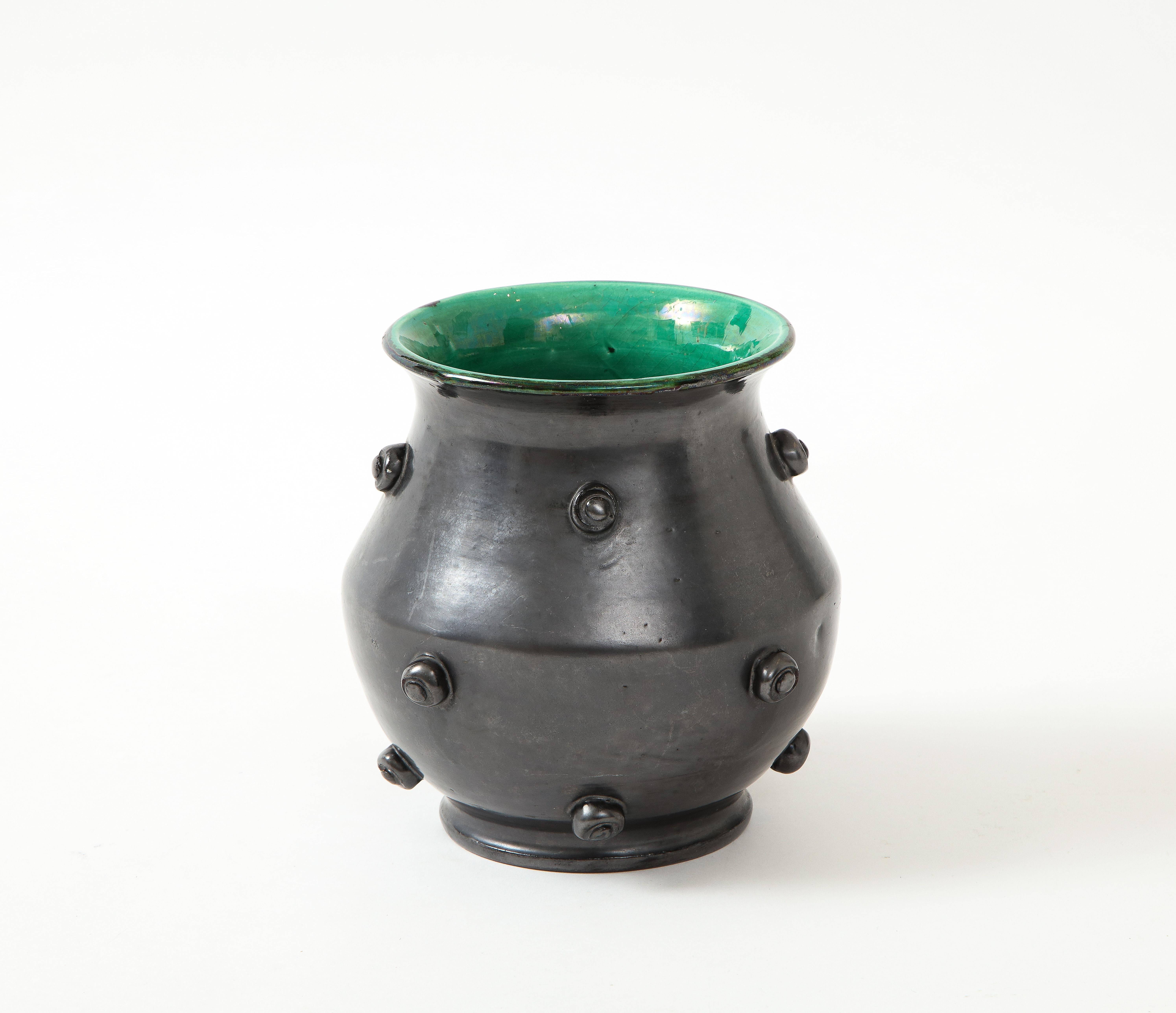 Matteblack glaze ceramic vase w/ green crackle interior, France, c. 1950.