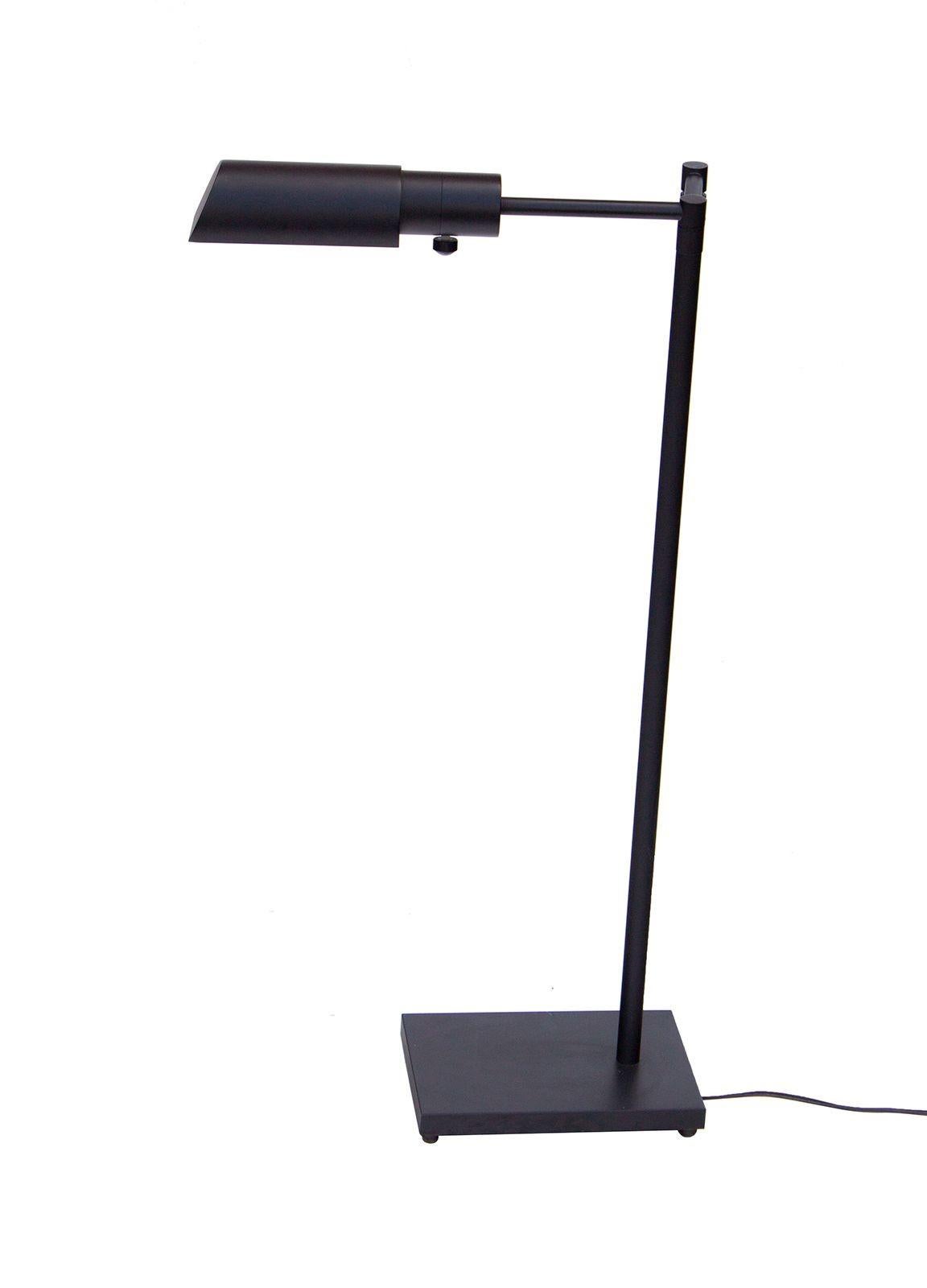Taiwan, 1990s
Library style adjustable swing arm floor lamp in black finish. This lamp is a lower height than many in this style- where many library style lamps have a telescoping height, this one does not telescope. Great for a reading chair. Made