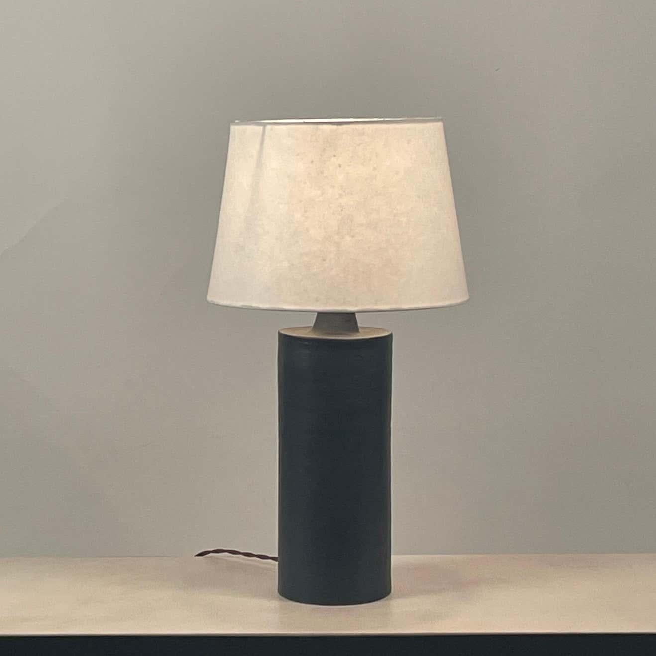 Perfect where a smaller, understated lamp is desired. Dimensions listed are the overall dimensions of the lamp with the shade.

The shade is 10 in. bottom diameter x 8 in. top diameter x 7 in. tall.