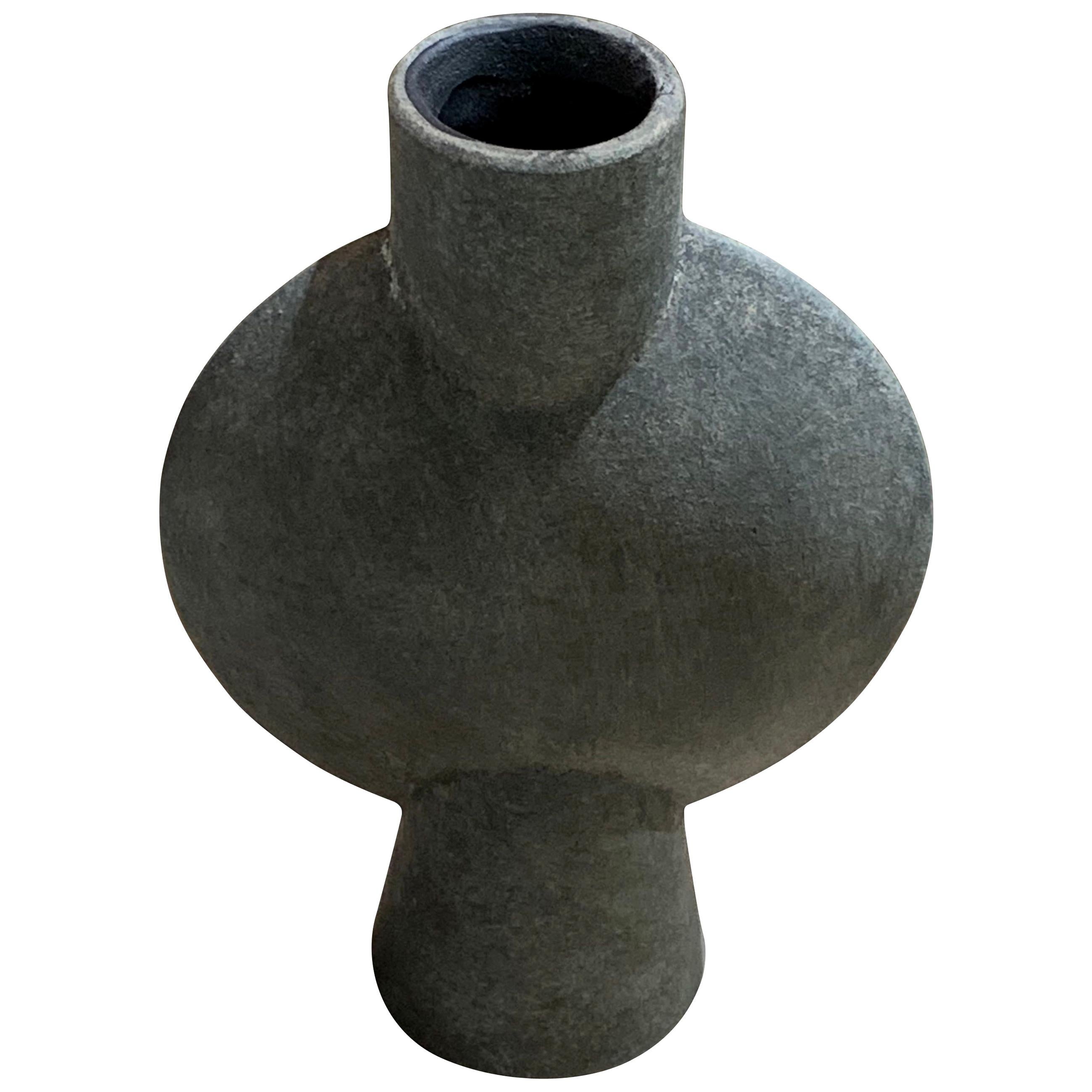 Contemporary Danish design tall matte grey bubble shaped ceramic vase.
Single tubular spout and base.
Two available and sold individually.

