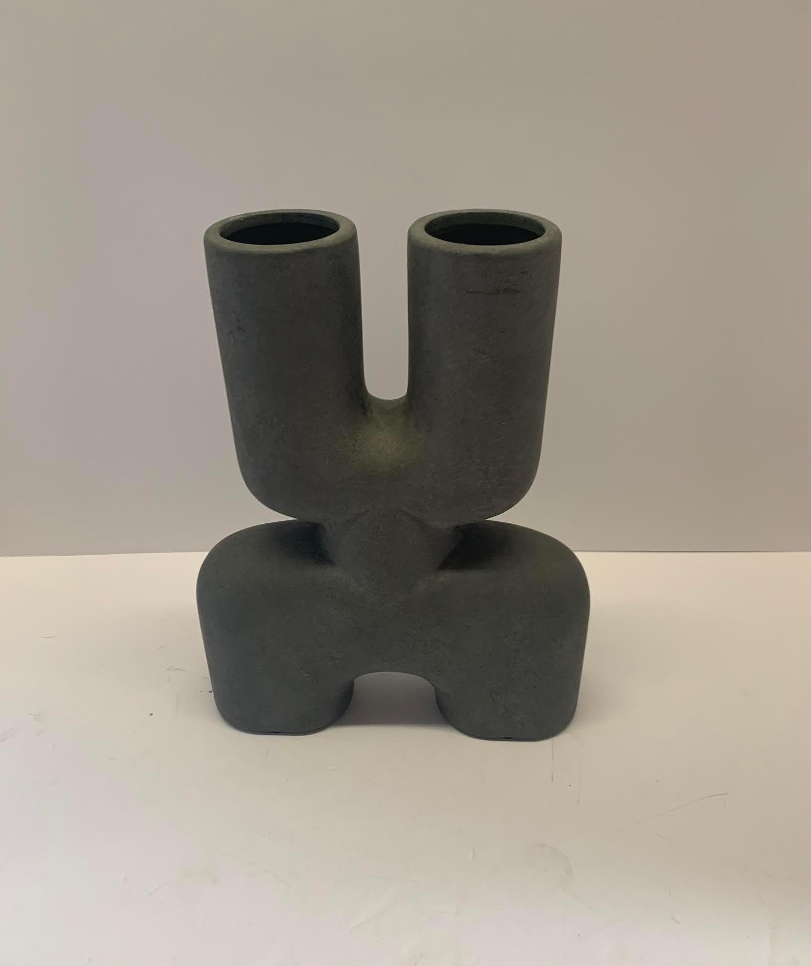 Contemporary Danish matte grey finish tall vase with double top spout and two bottom spouts
Very sculptural in design
Three available.
 