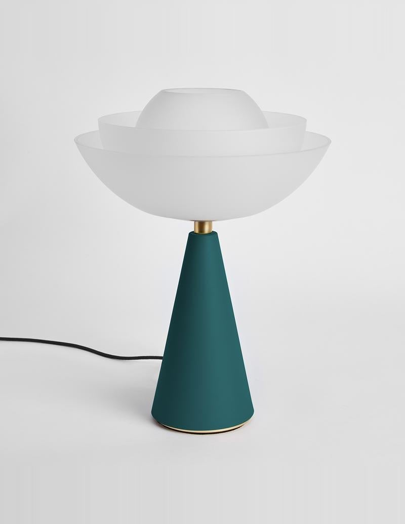Matte Lotus table lamp by Mason Editions.
Dimensions: 36 × 48 cm
Materials: Blown glass + metal
Colours: pink, sage green, petrol green, light grey or black base + transparent opal blown glass
All our lamps can be wired according to each