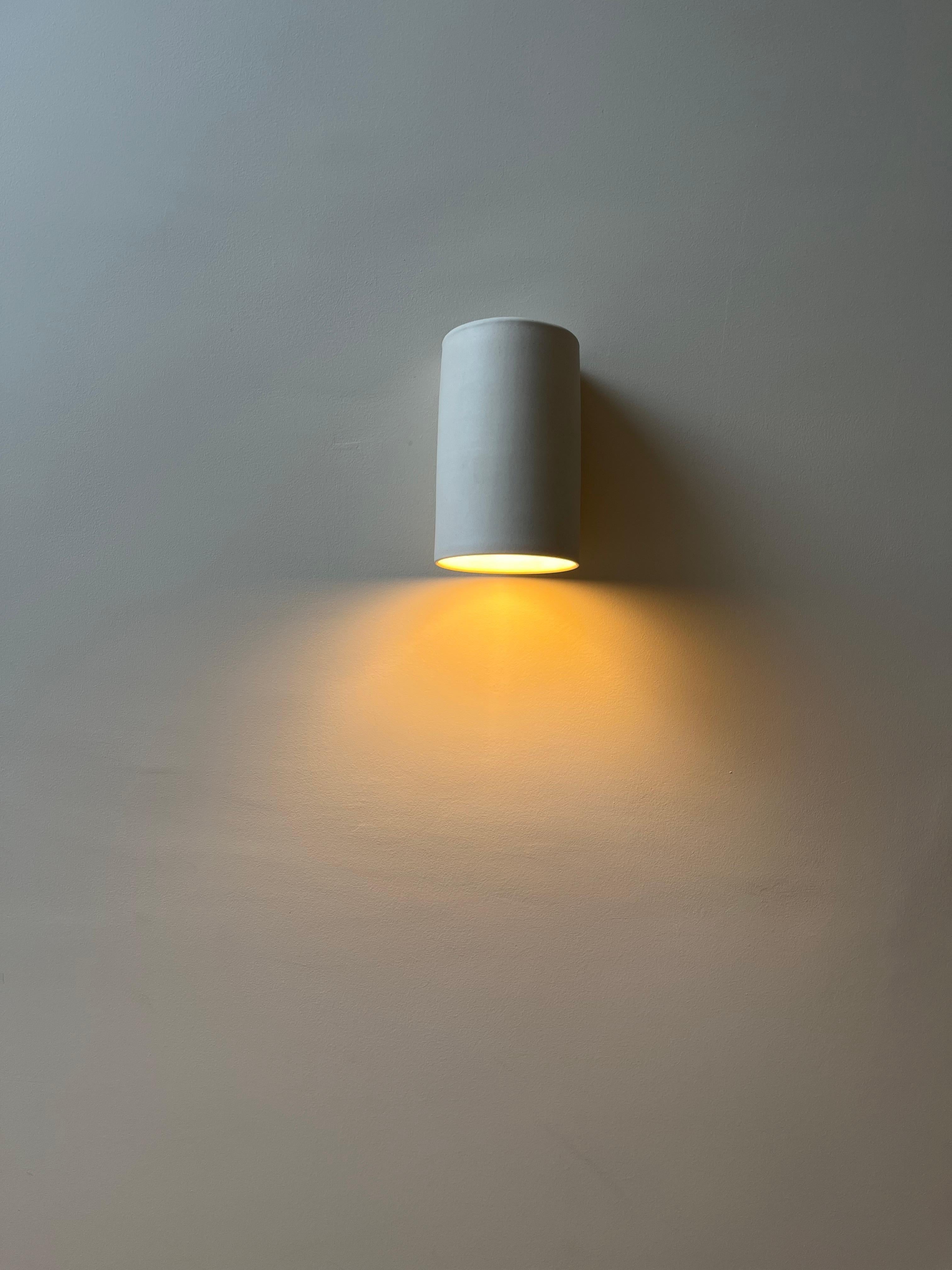 matte off-white wall light made of glazed ceramic, blends in with the wall For Sale 2