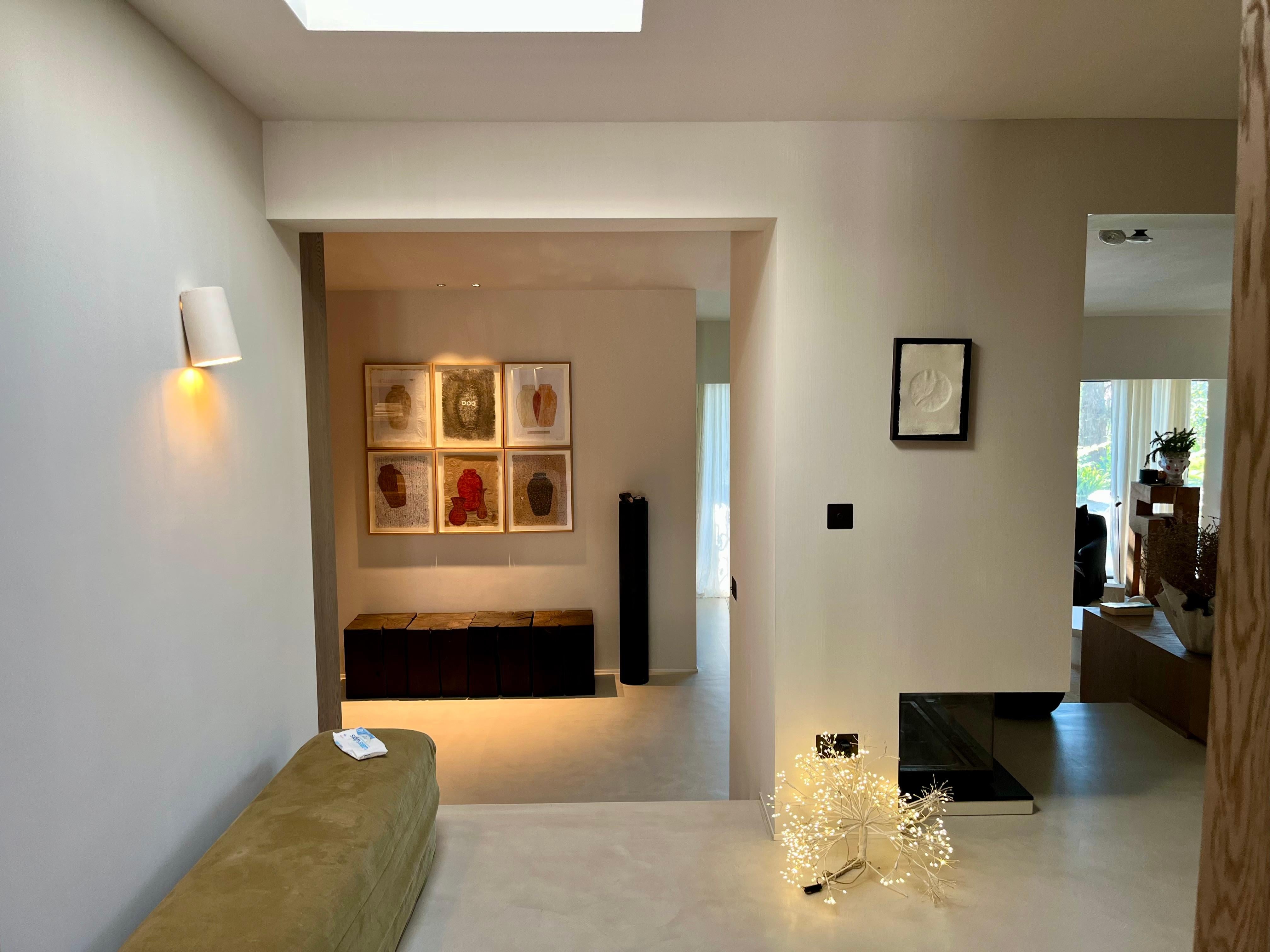 Ceramic hand - crafted wall sconce, designed and signed by Rulo and Manolo Eirin. Interior and exterior vitrified in white, which allows a greater projection of light on the wall. The electrical connection of the lamp is suitable for both the