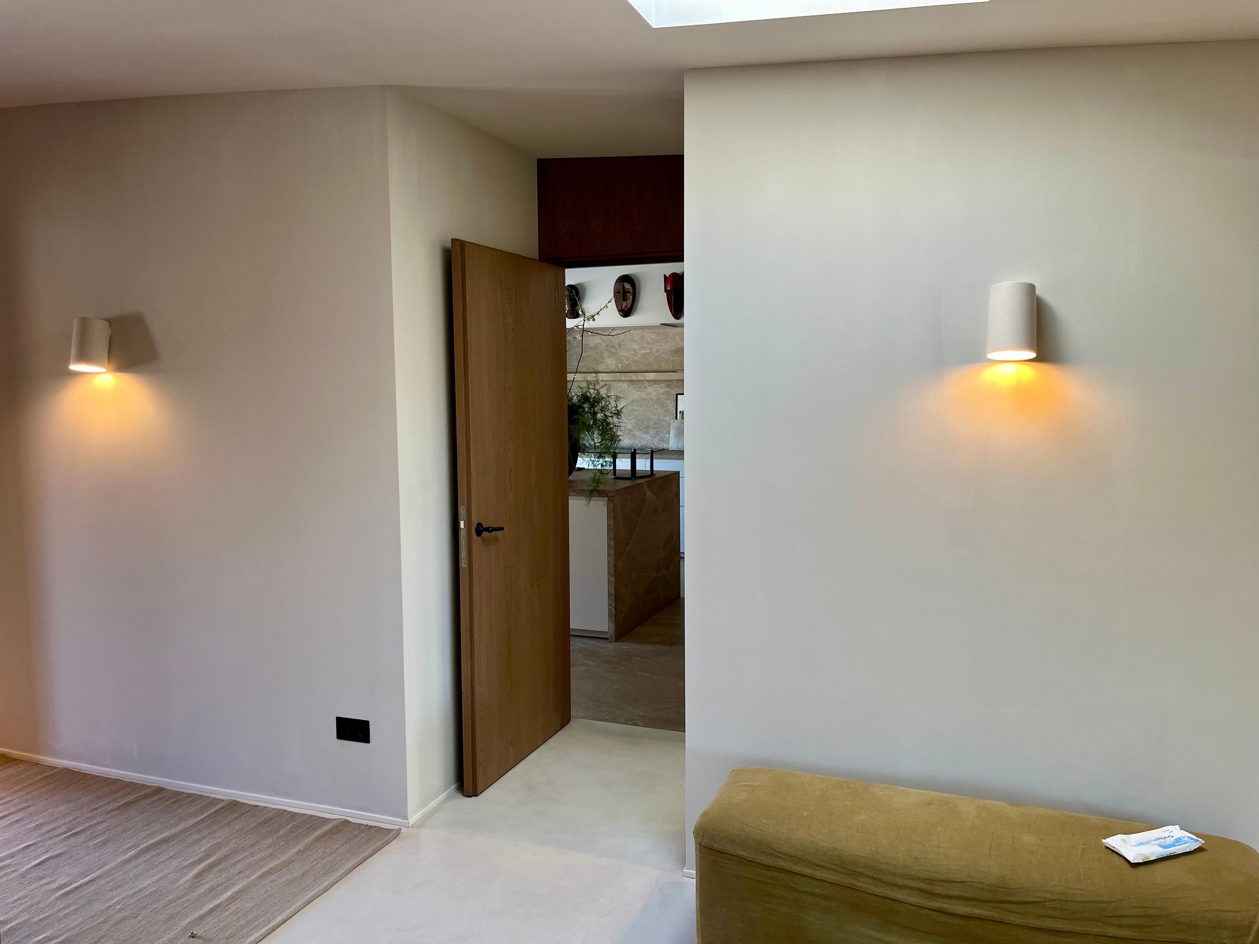 matte off-white wall light made of glazed ceramic, blends in with the wall In New Condition For Sale In Carballo, ES