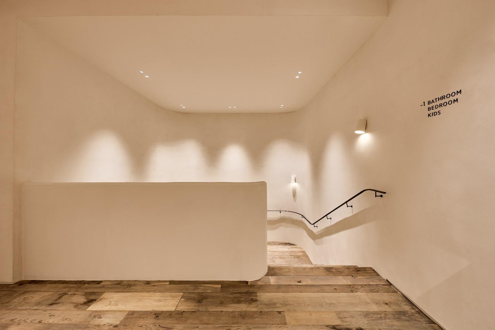 matte off-white wall light made of glazed ceramic, blends in with the wall For Sale 1